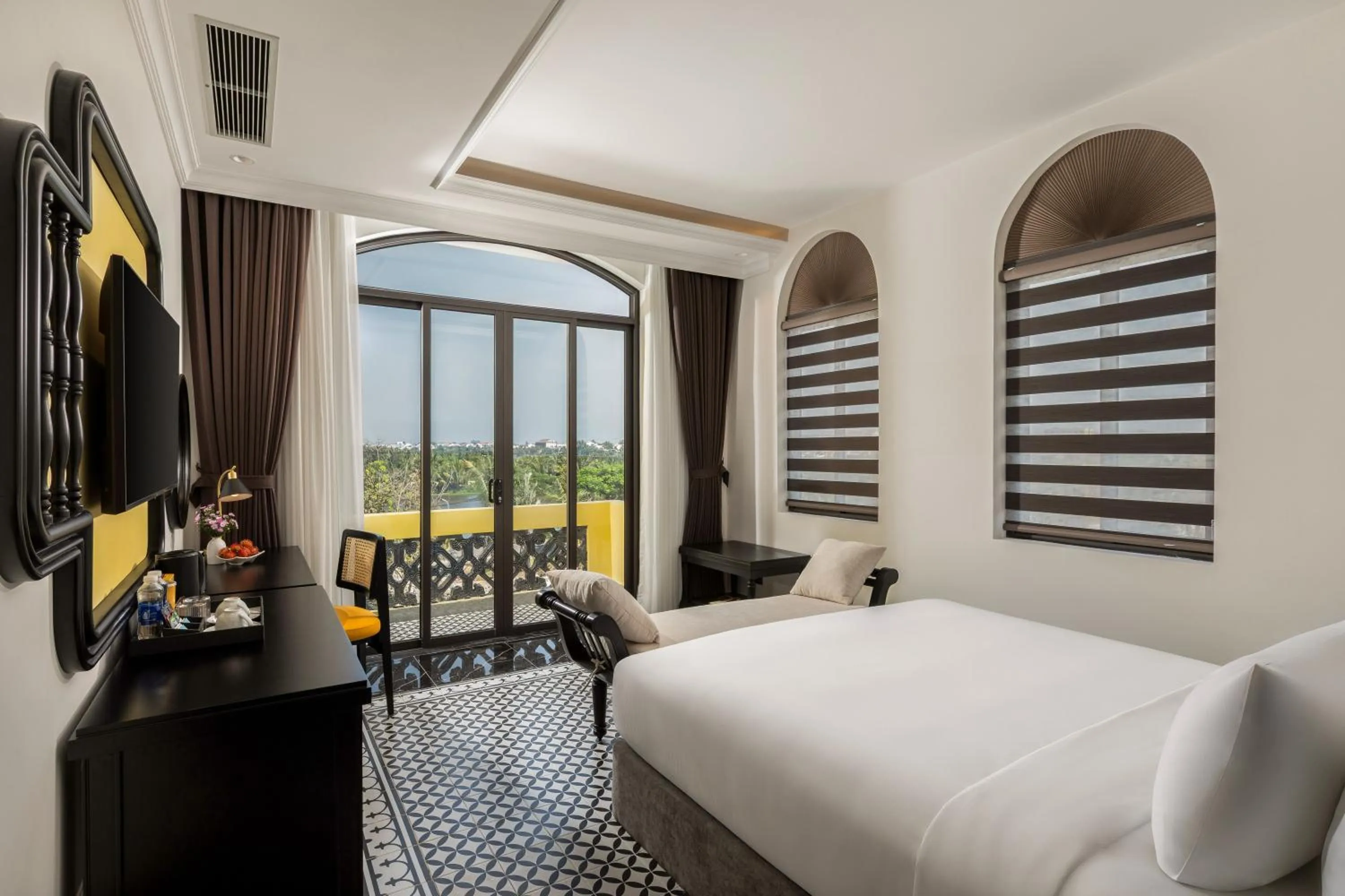 Bed in Nesta Hoian Resort & Spa