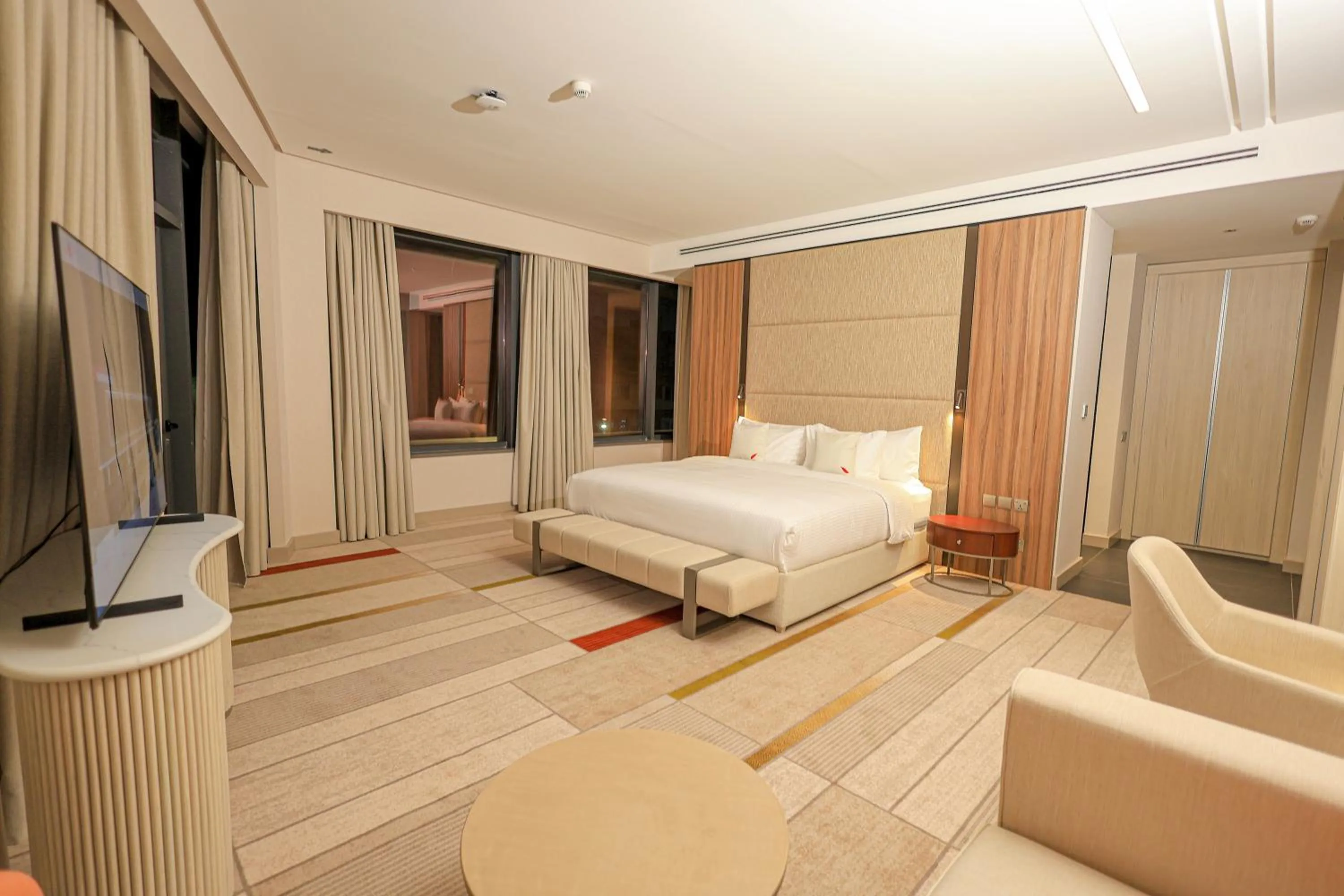 Bed in Swisstouches Hotel Amman