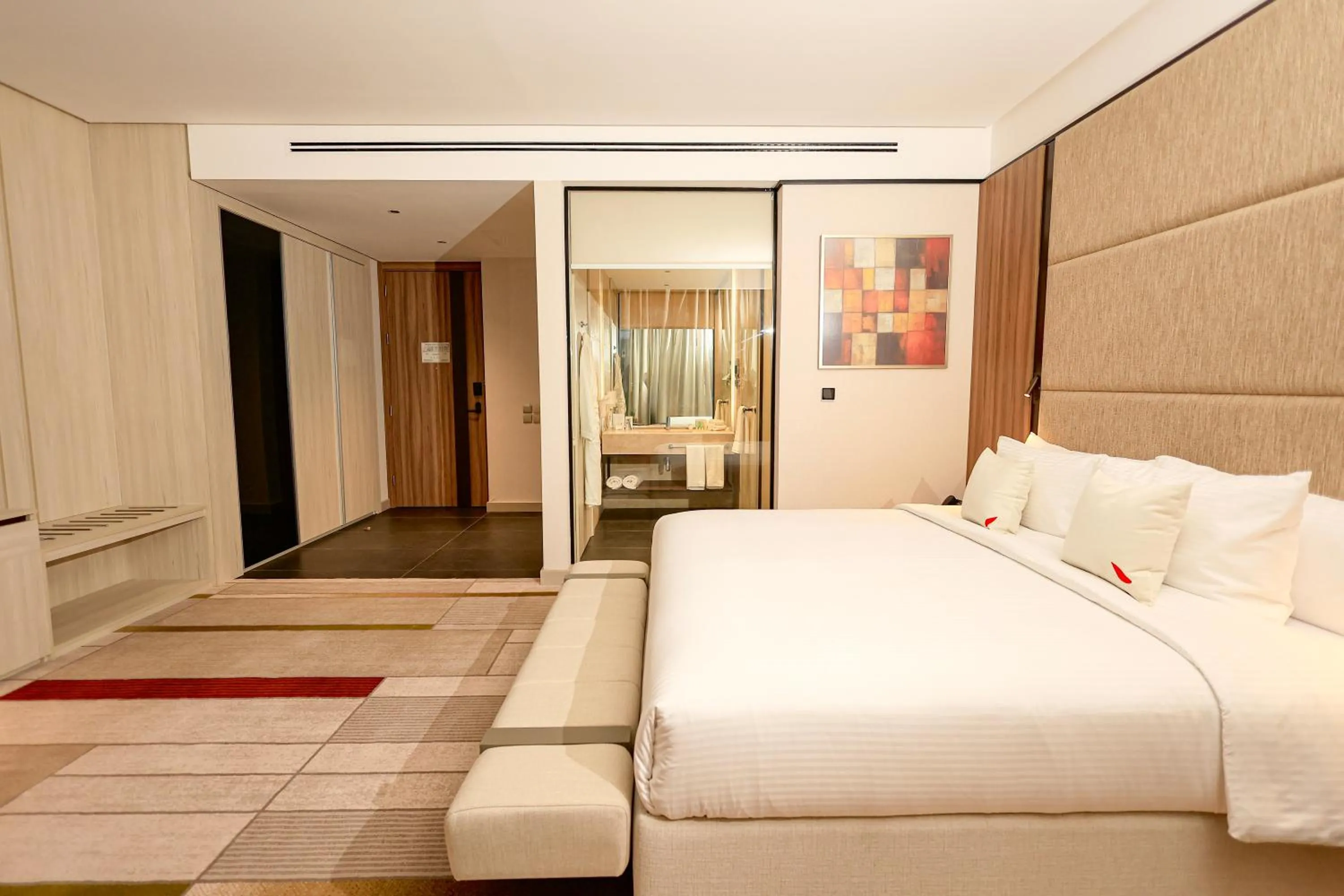 Bed in Swisstouches Hotel Amman