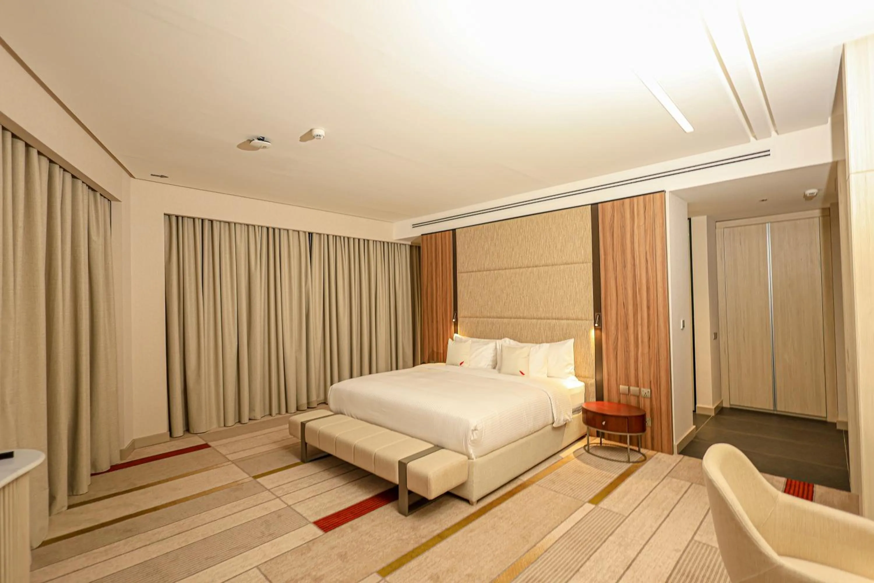 Bed in Swisstouches Hotel Amman