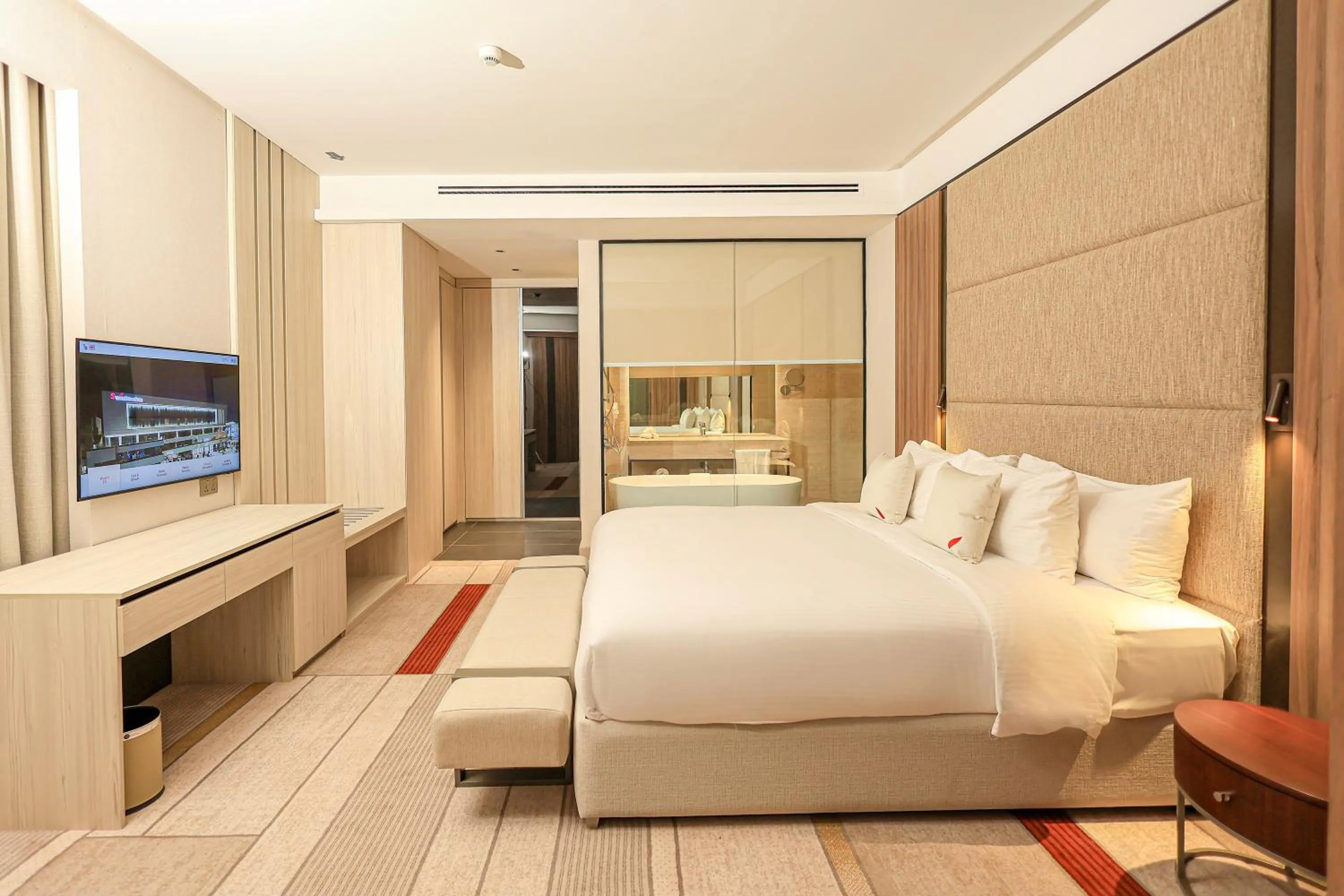 Bed in Swisstouches Hotel Amman