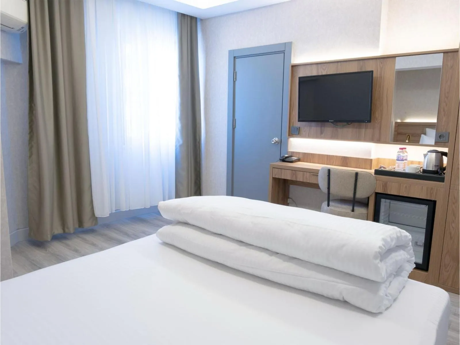 Bed in Optimal Hotel