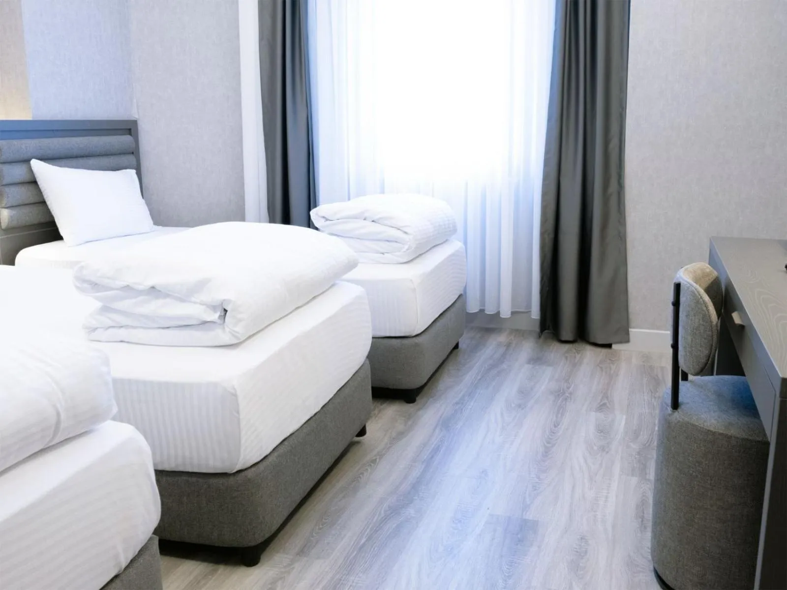 Bed in Optimal Hotel