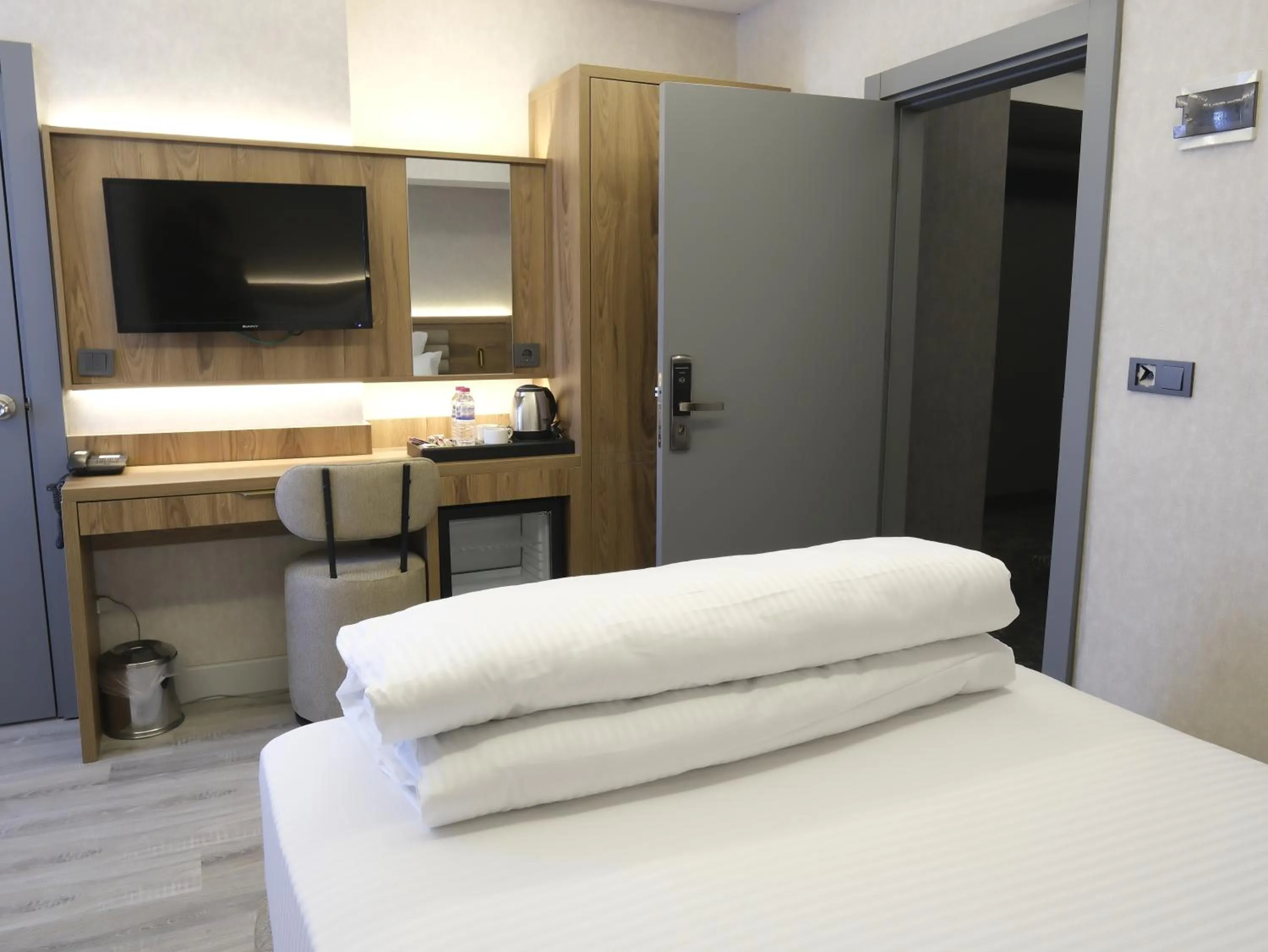 Bed in Optimal Hotel