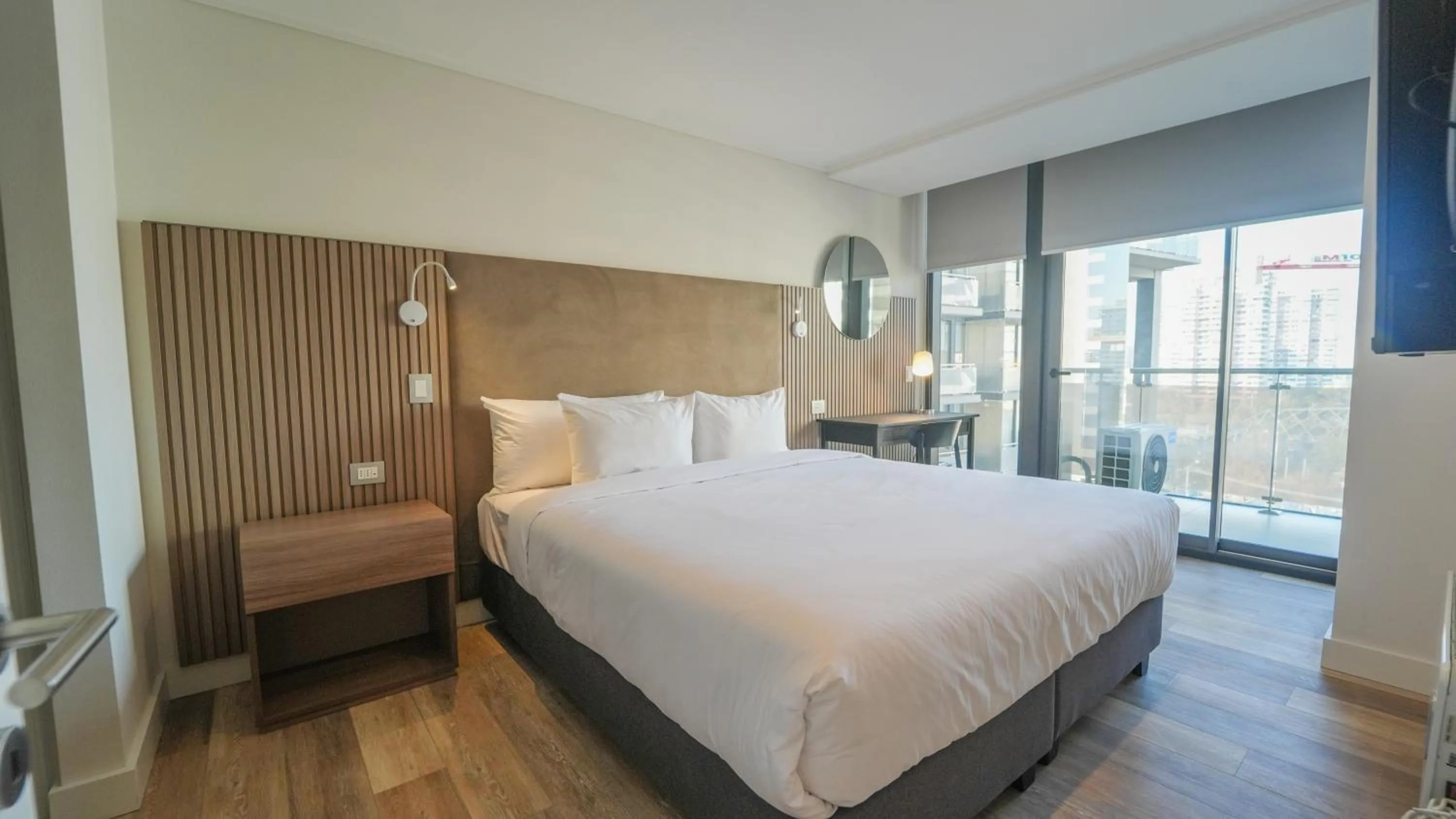 Photo of the whole room, Bed in Spot Suites