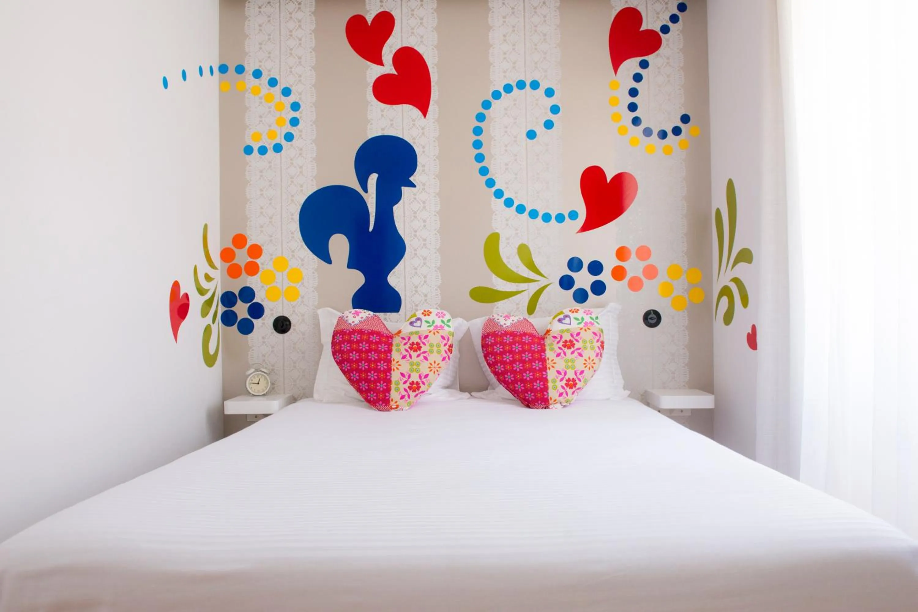 Bed in Páteo Saudade Lofts