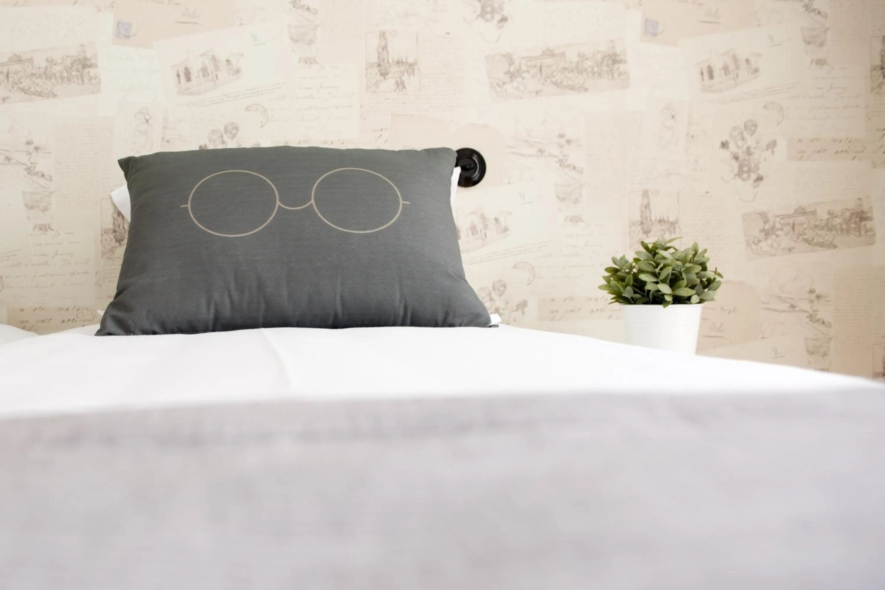 Bed in Páteo Saudade Lofts