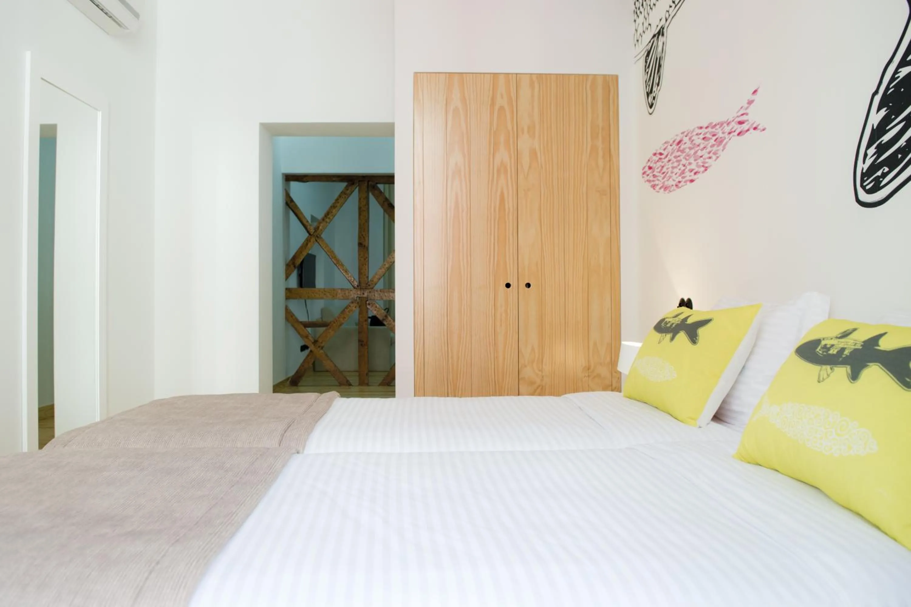 Bed in Páteo Saudade Lofts