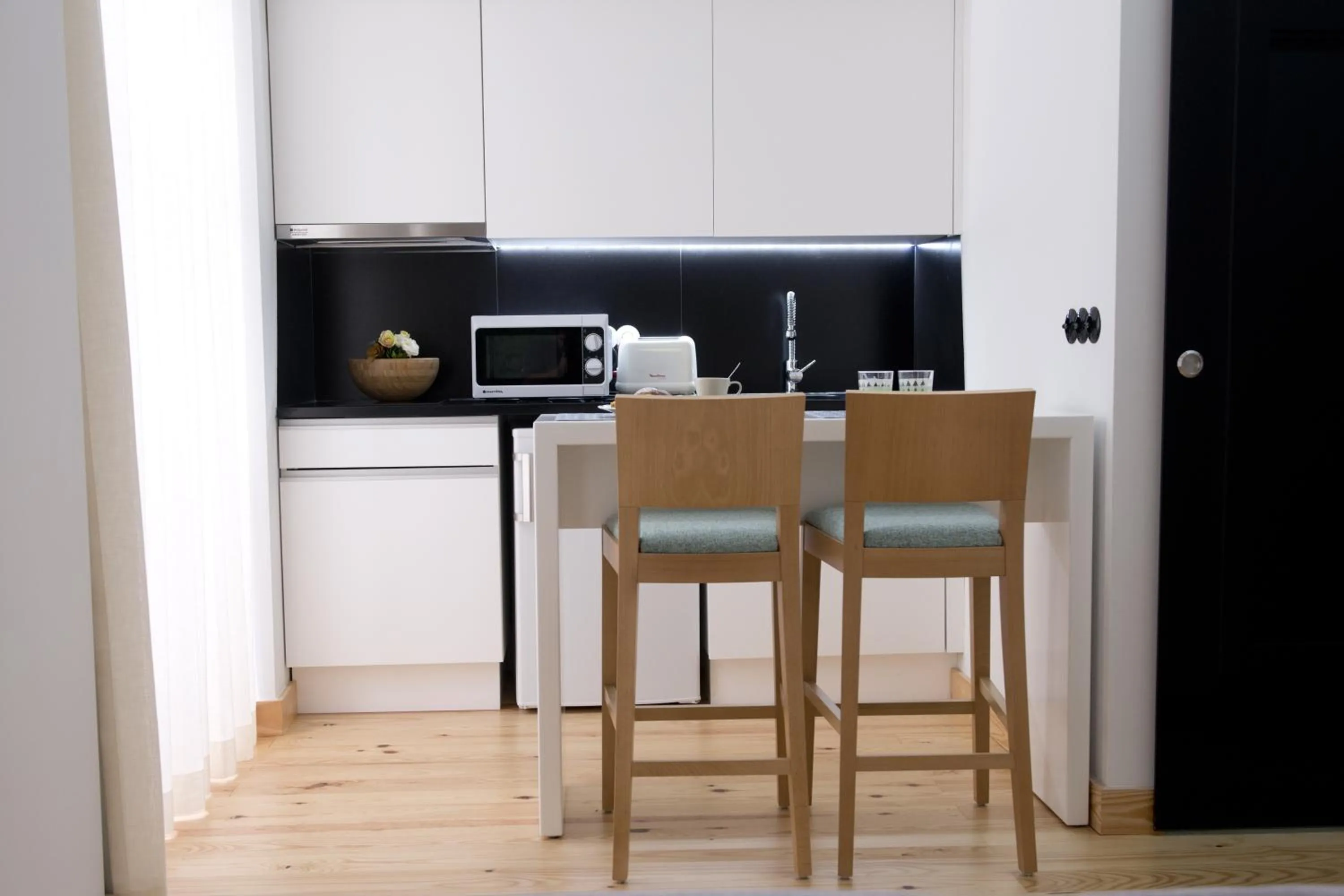 Kitchen or kitchenette in Páteo Saudade Lofts