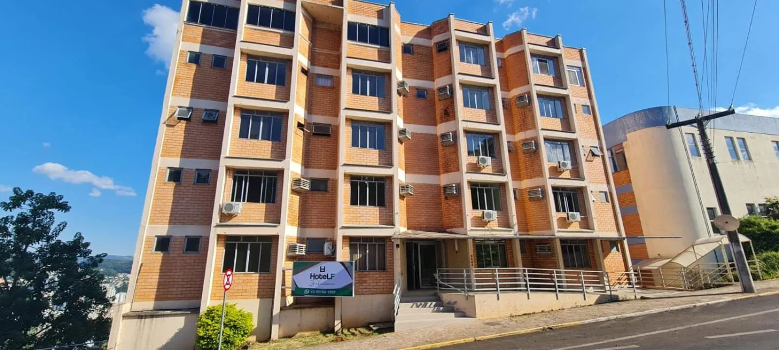 Facade/entrance in Hotel LF by Feliciano Joaçaba