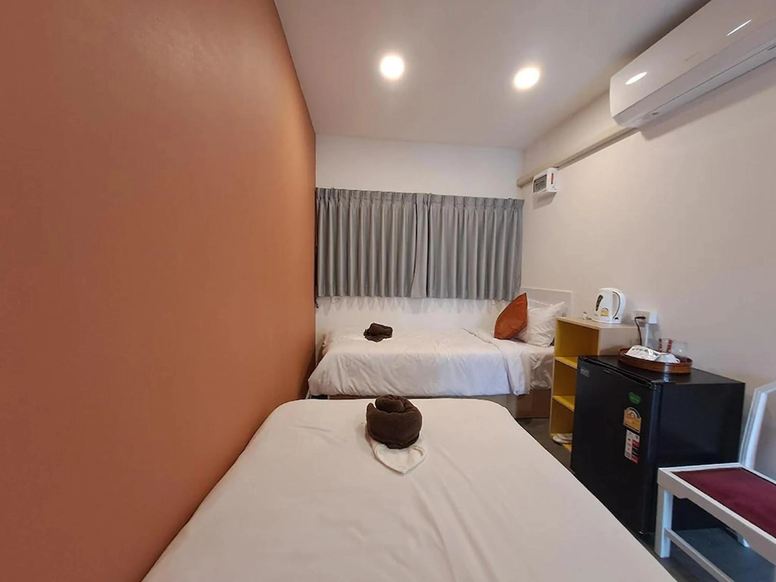 Bed in Nomads Homestay Sriracha
