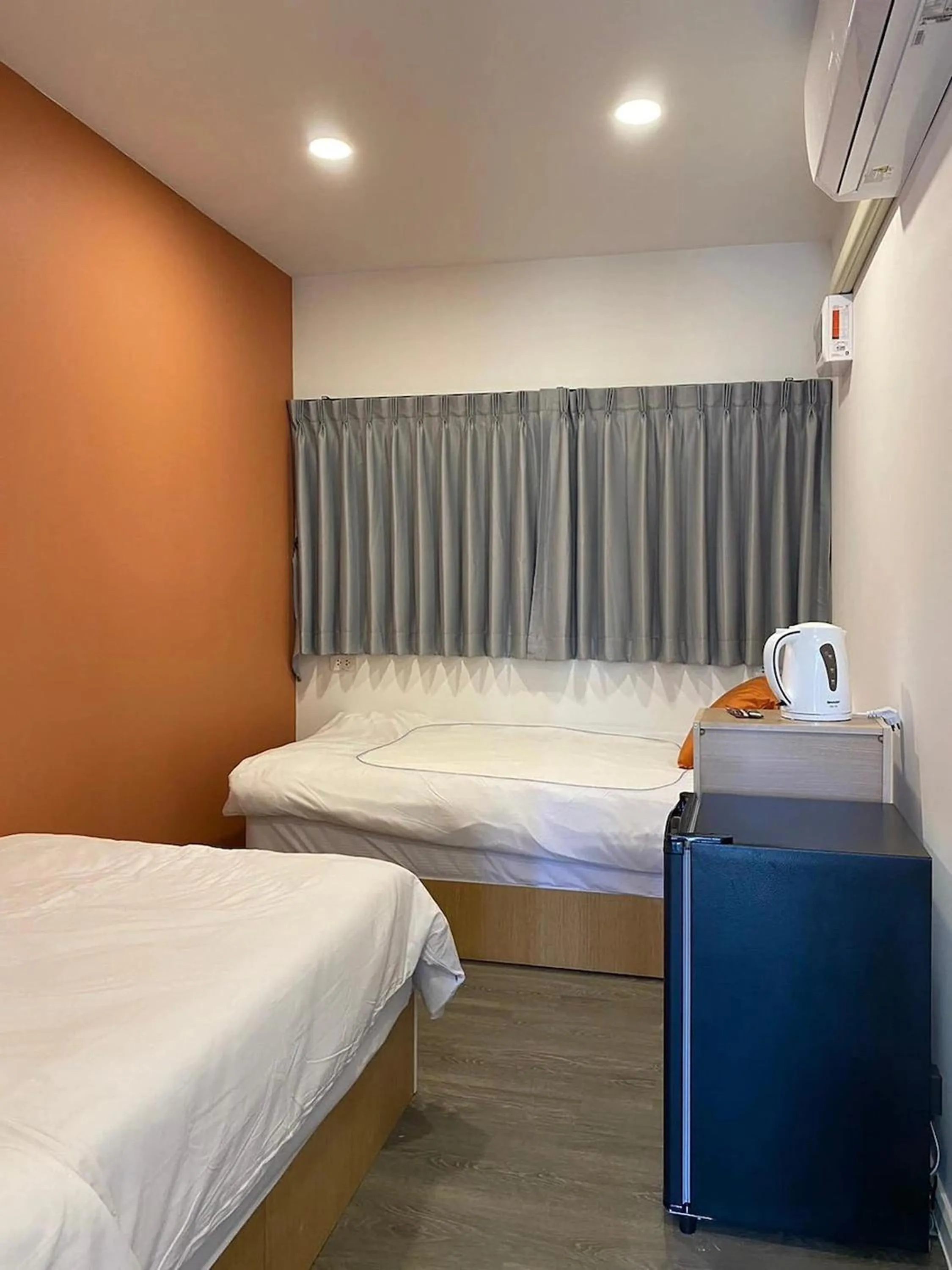 Bed in Nomads Homestay Sriracha