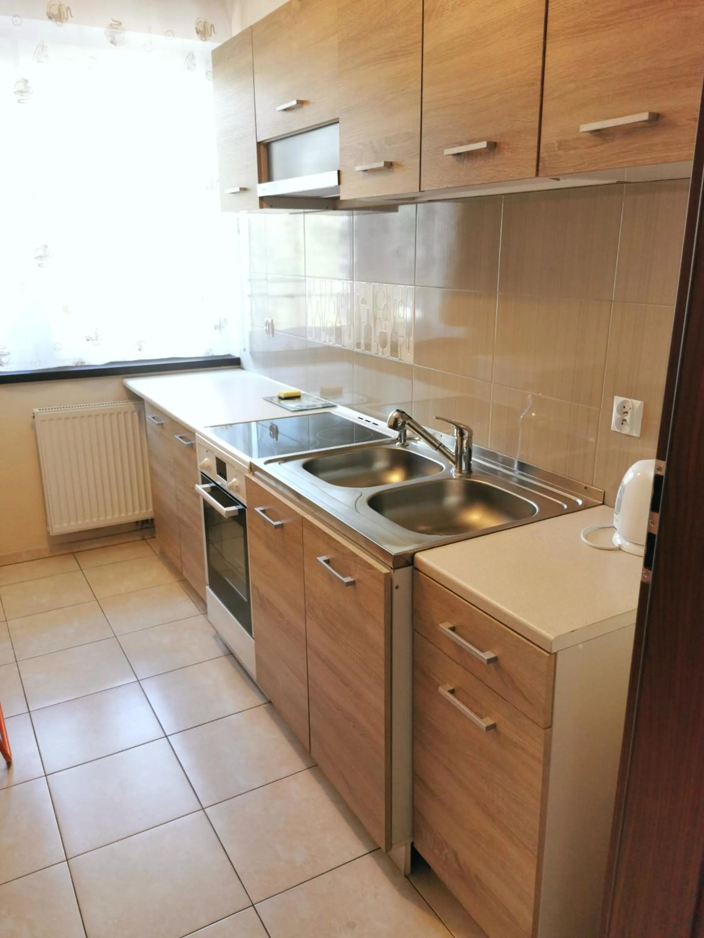Kitchen or kitchenette in Apartamenty Dolna Kraków
