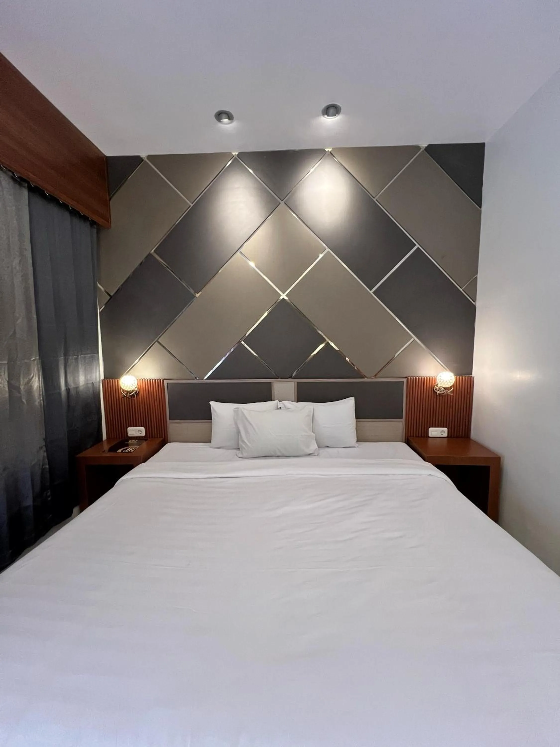 Bed in Hotel The Sri Rejeki