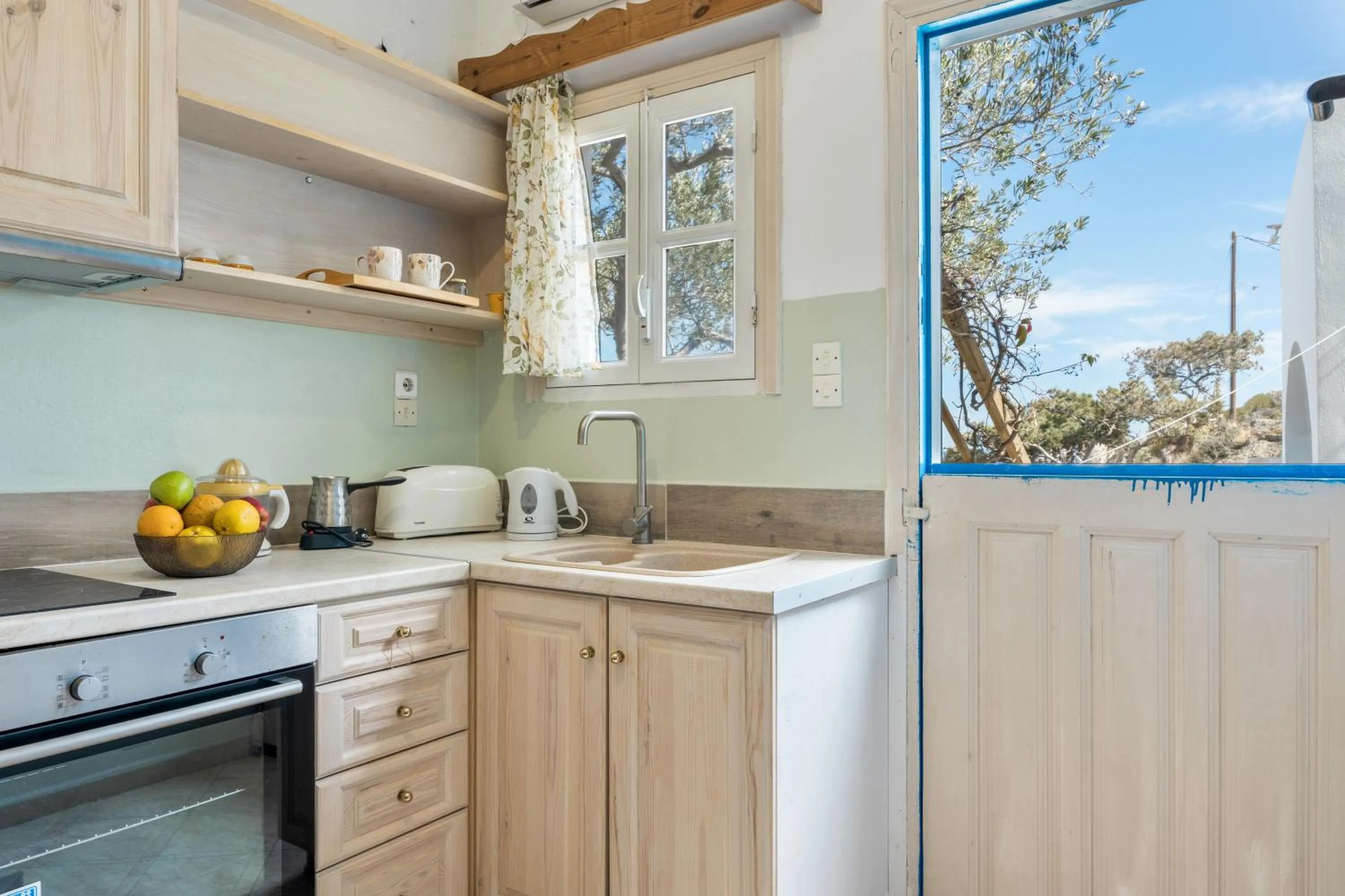 Kitchen or kitchenette in Hotel Glaros Karpathos