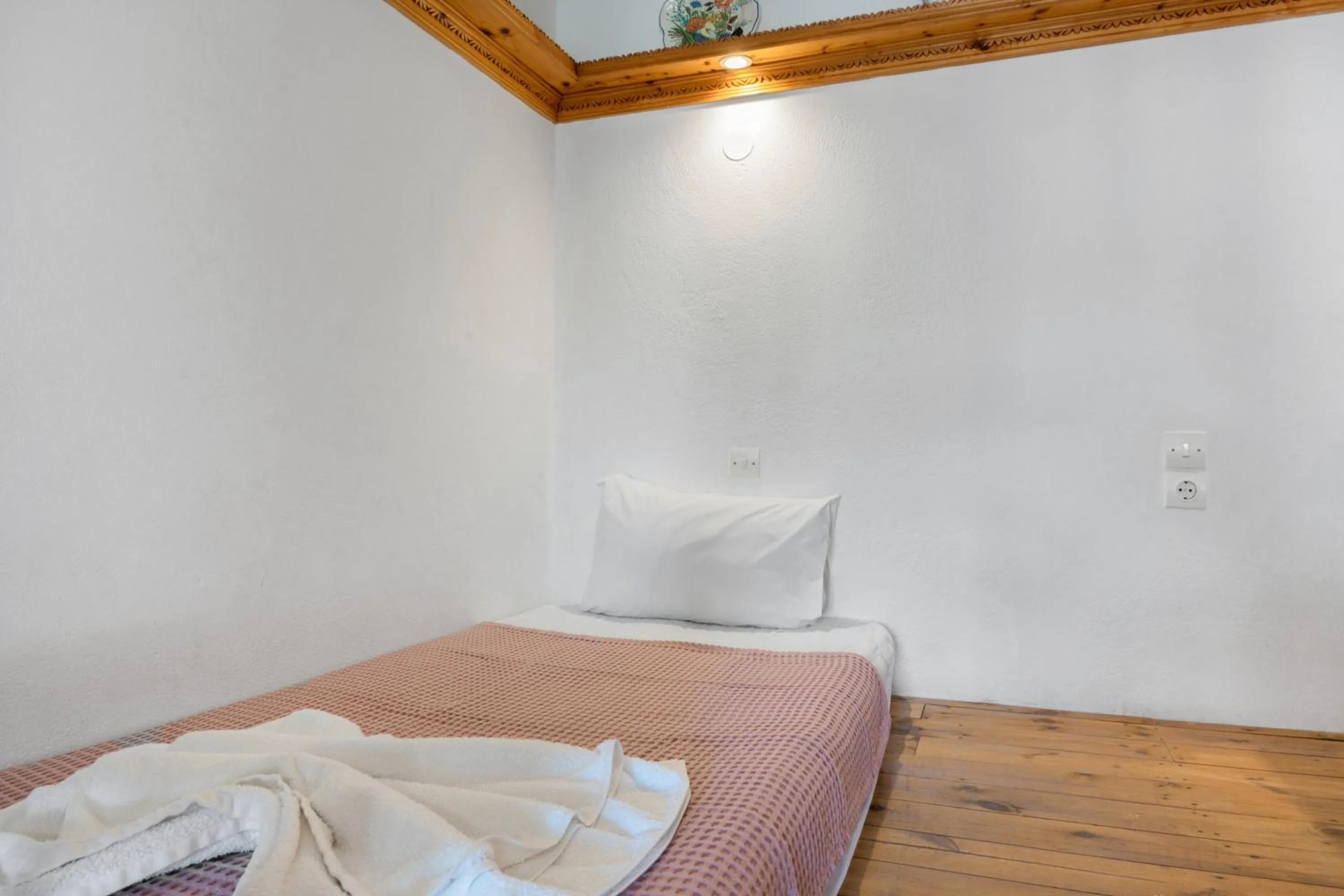 Property building, Bed in Hotel Glaros Karpathos
