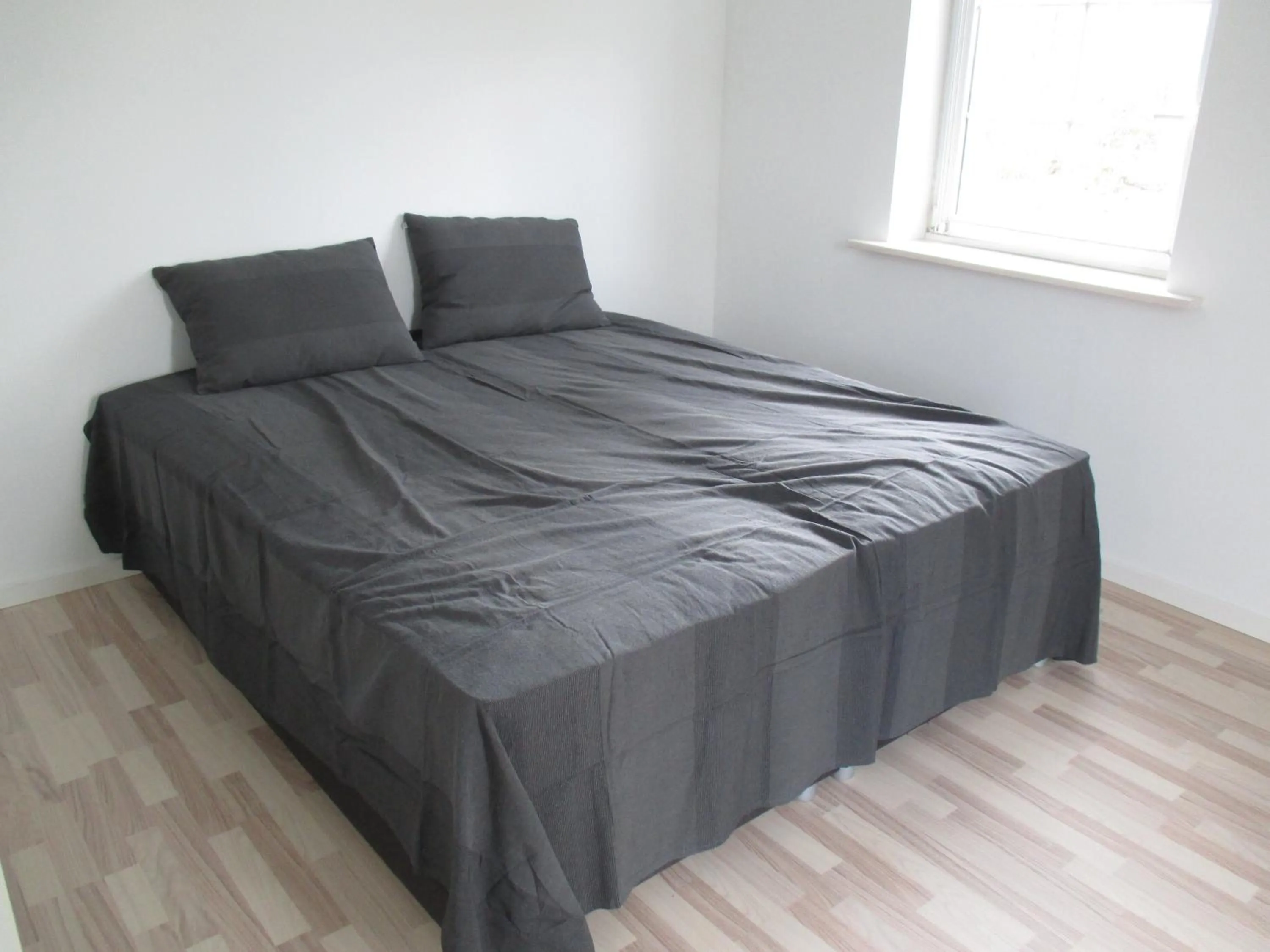 Bed in White House Hotel Apartments