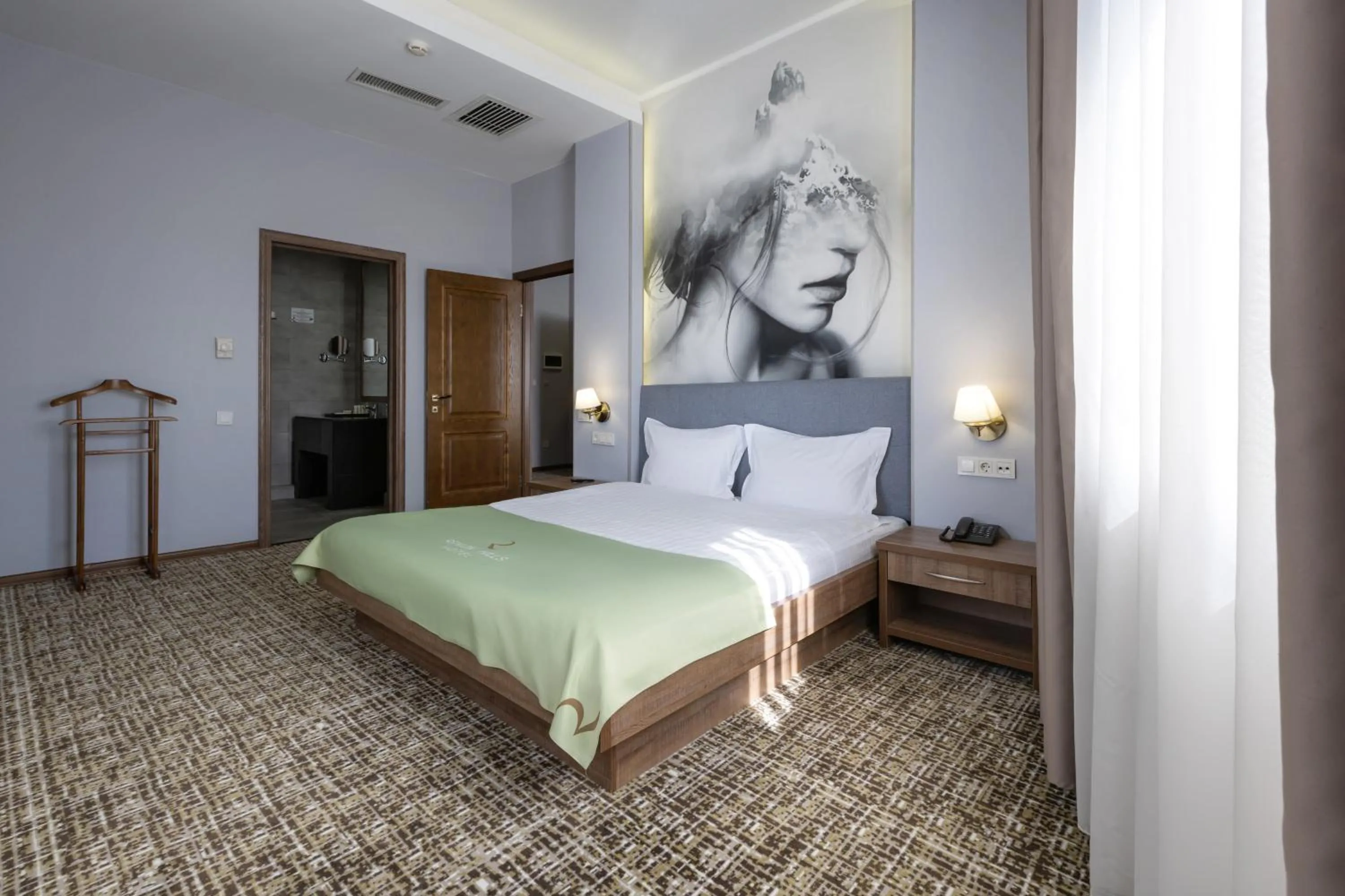 Bed in Renion Hills Hotel