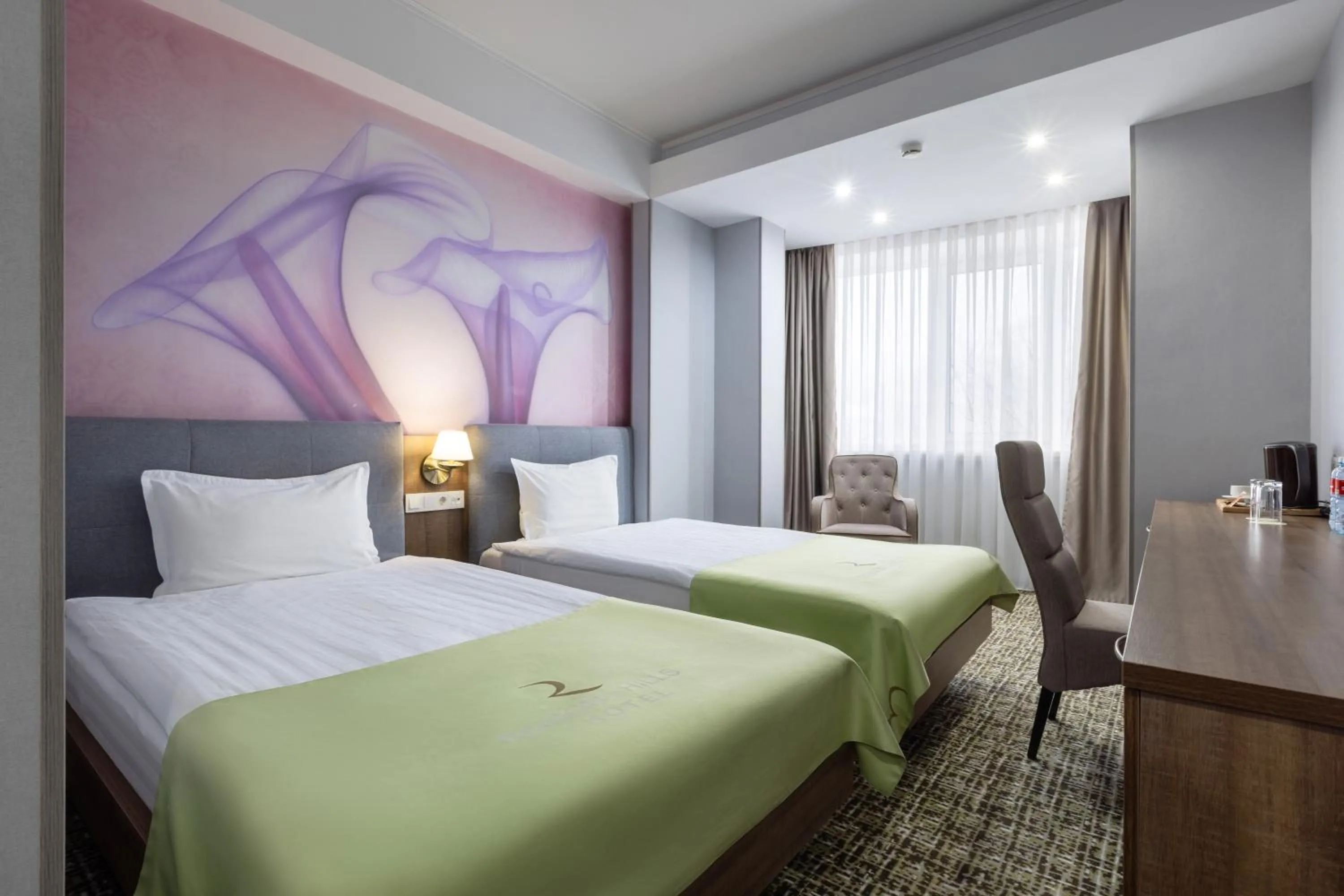 Bed in Renion Hills Hotel