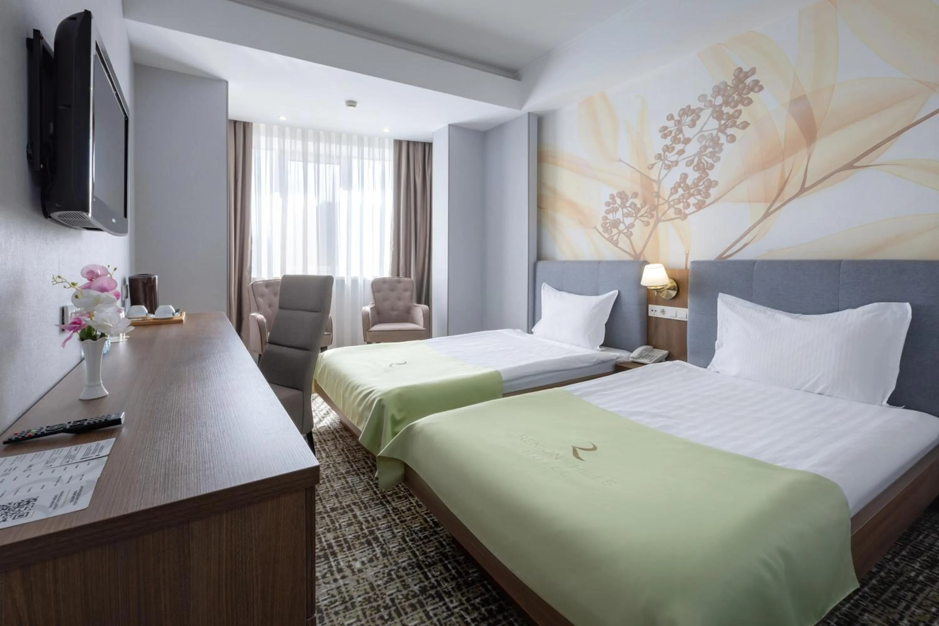 Bed in Renion Hills Hotel