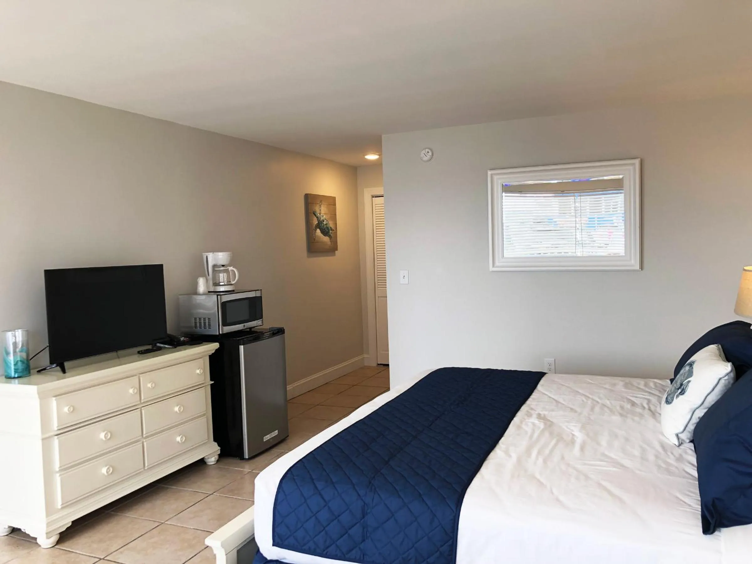 Bed in Aqua Beach Hotel