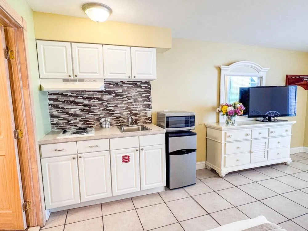 Kitchen or kitchenette in Aqua Beach Hotel
