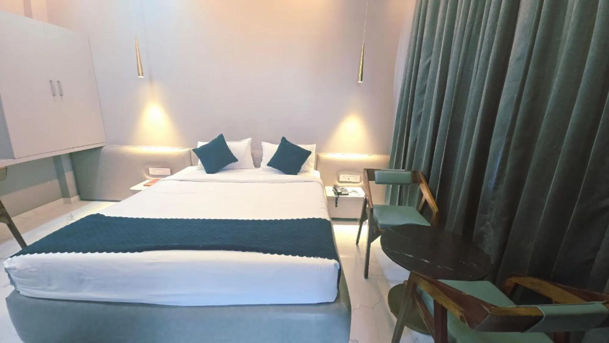 Bed in Hotel Laxmi Elite Karad