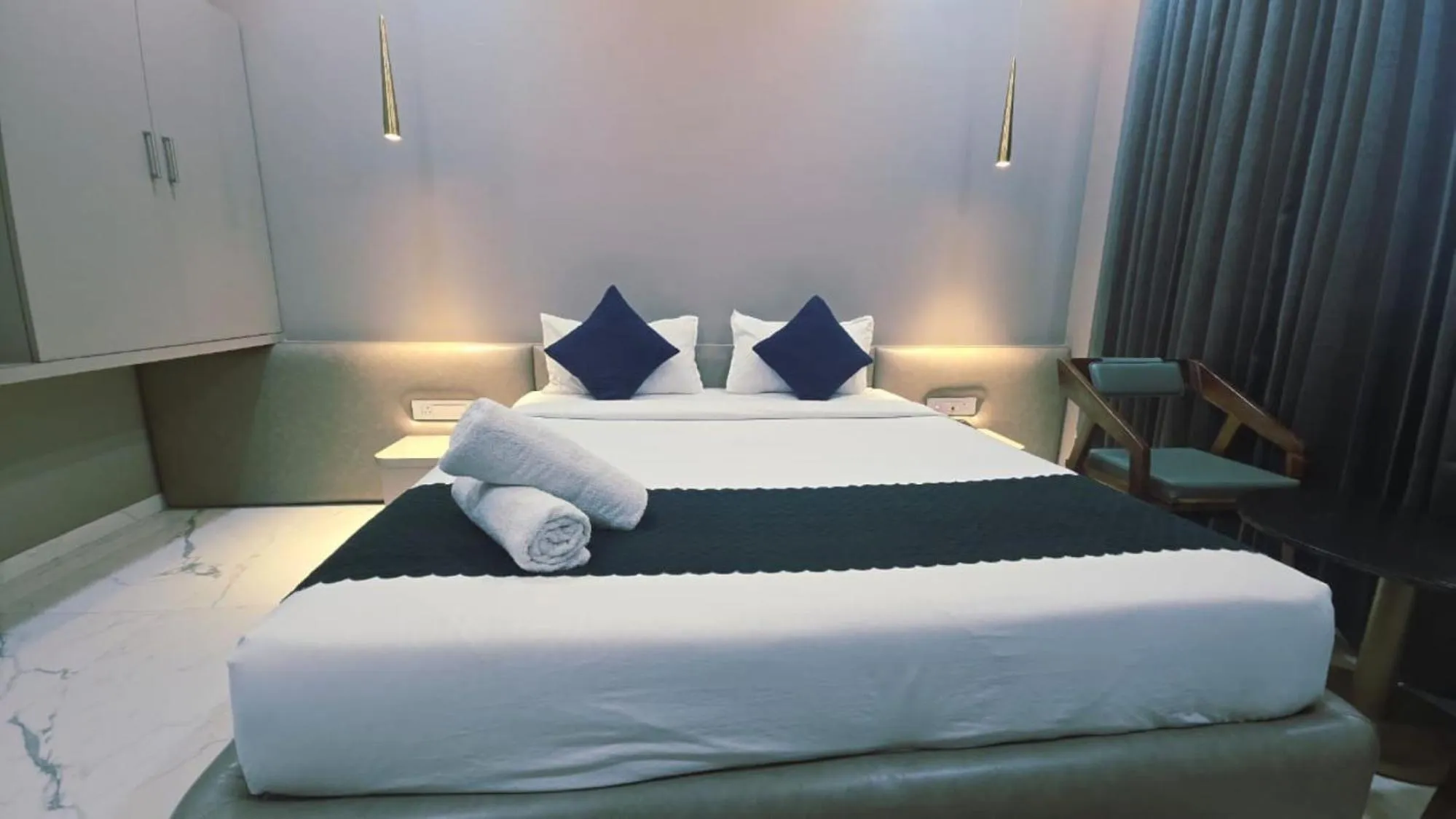 Bed in Hotel Laxmi Elite Karad