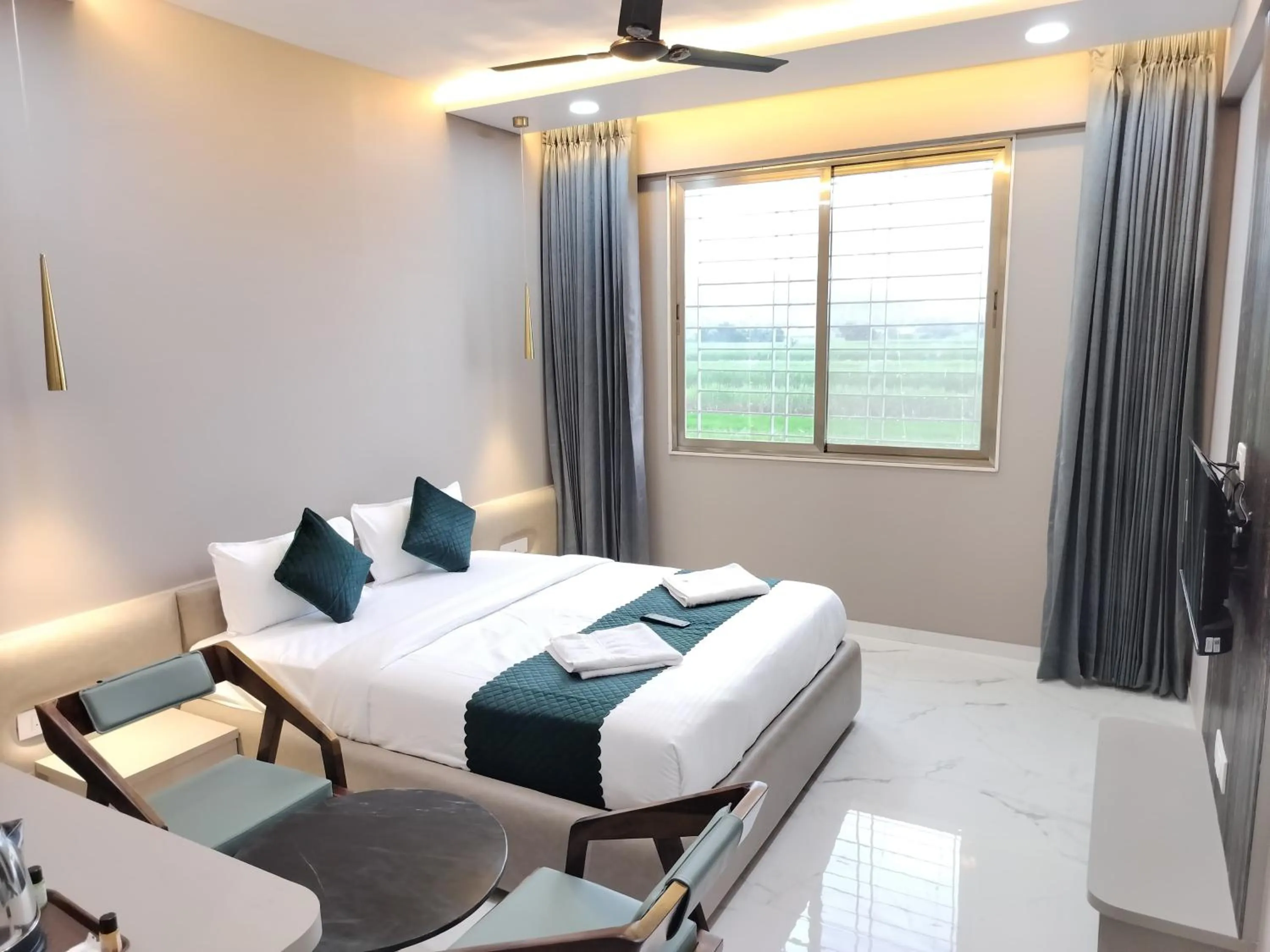 Bed in Hotel Laxmi Elite Karad