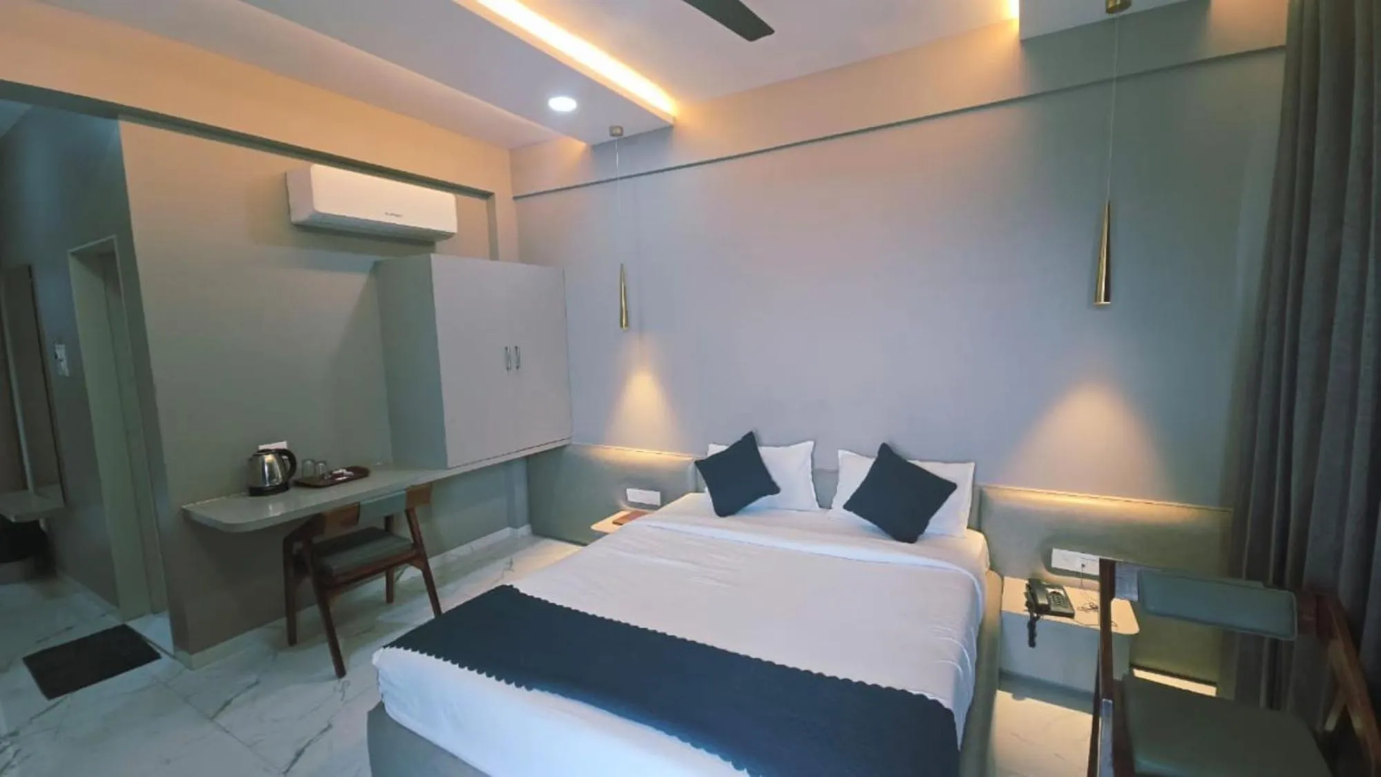 Bed in Hotel Laxmi Elite Karad