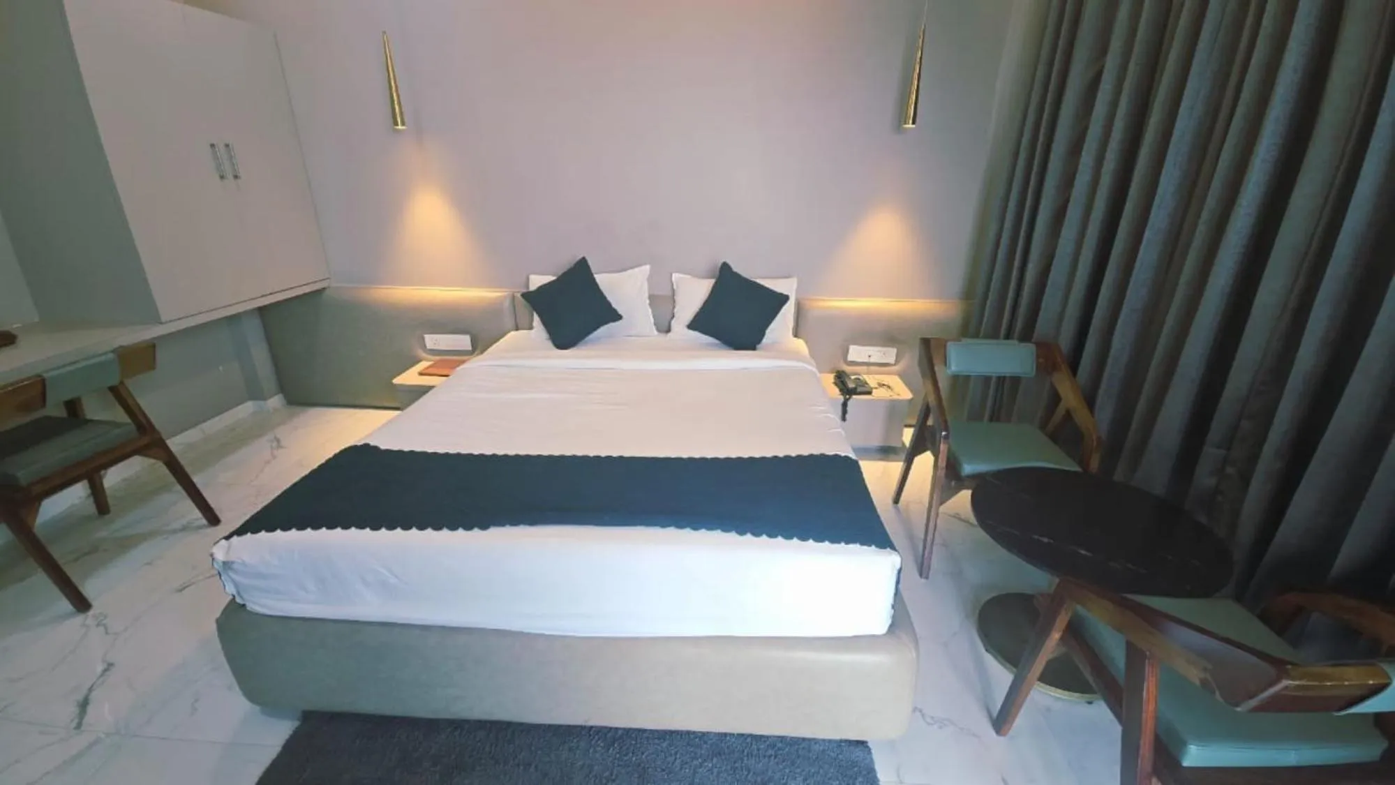 Bed in Hotel Laxmi Elite Karad