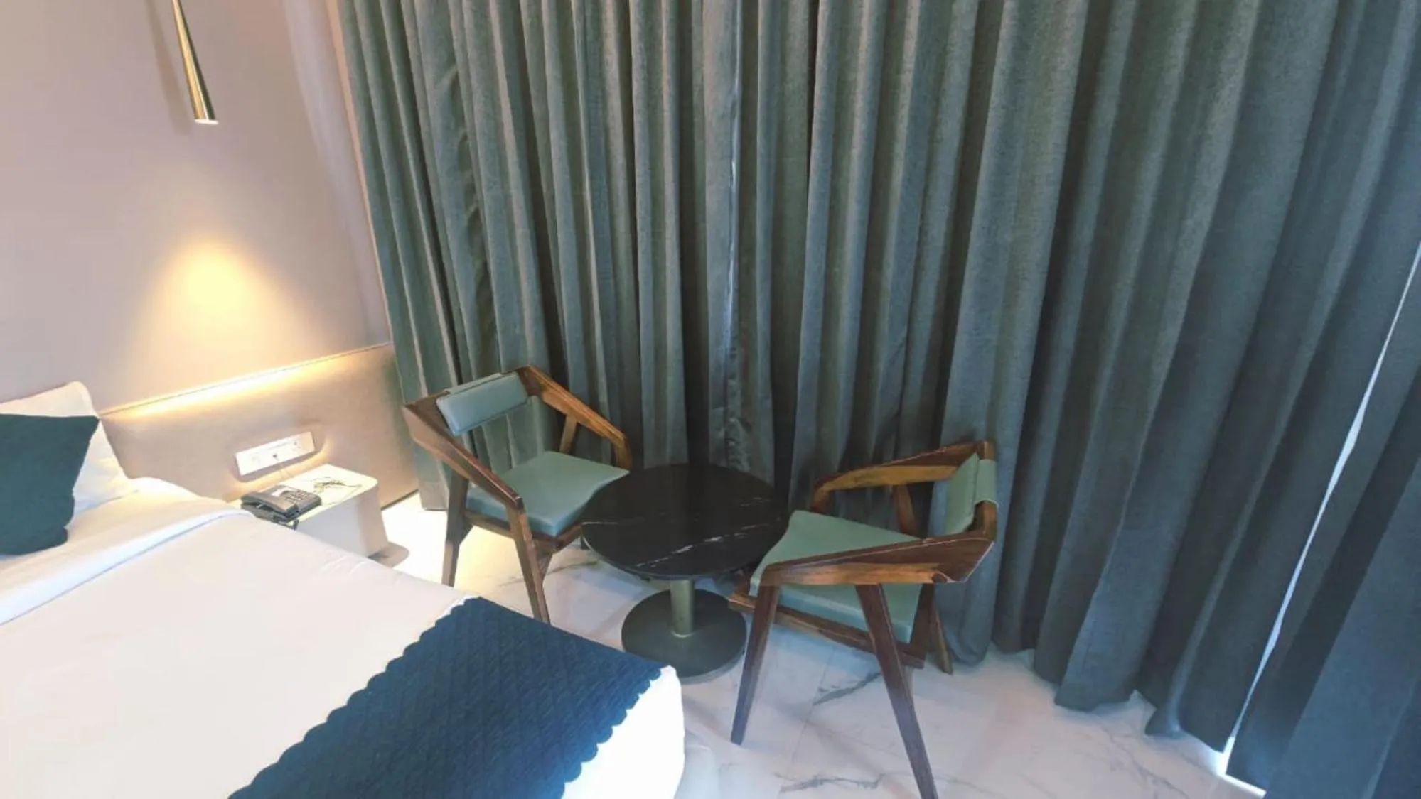 Bed in Hotel Laxmi Elite Karad