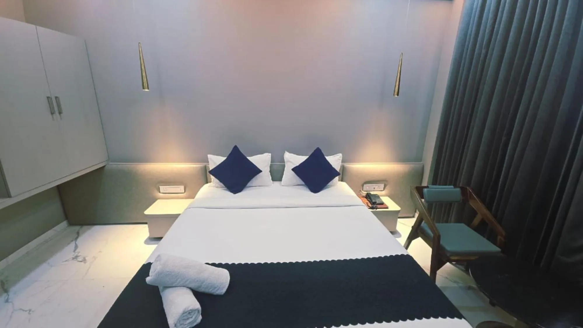 Bed in Hotel Laxmi Elite Karad