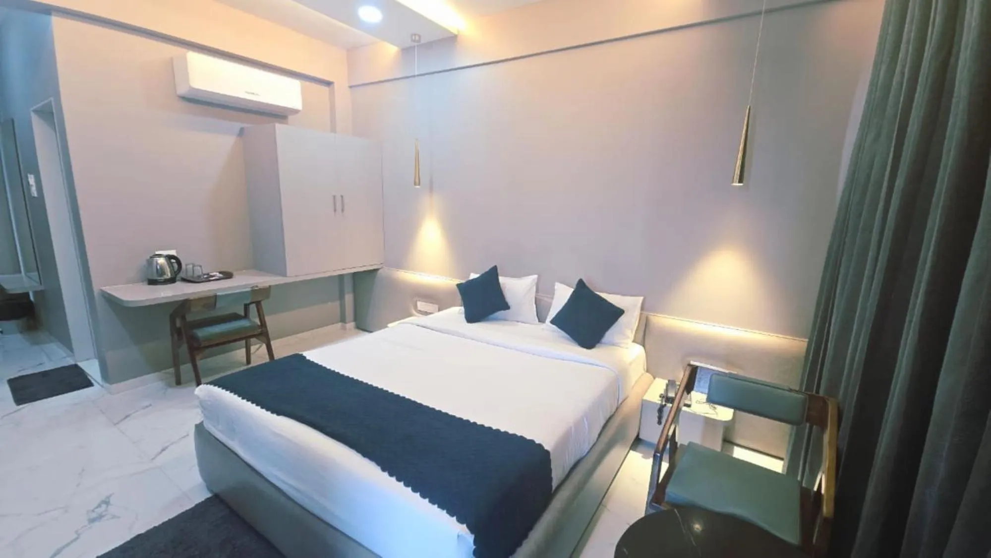 Bed in Hotel Laxmi Elite Karad