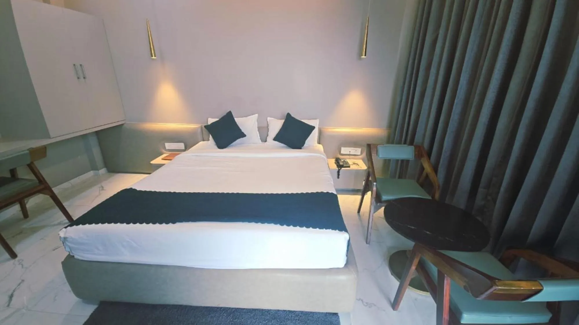 Bed in Hotel Laxmi Elite Karad