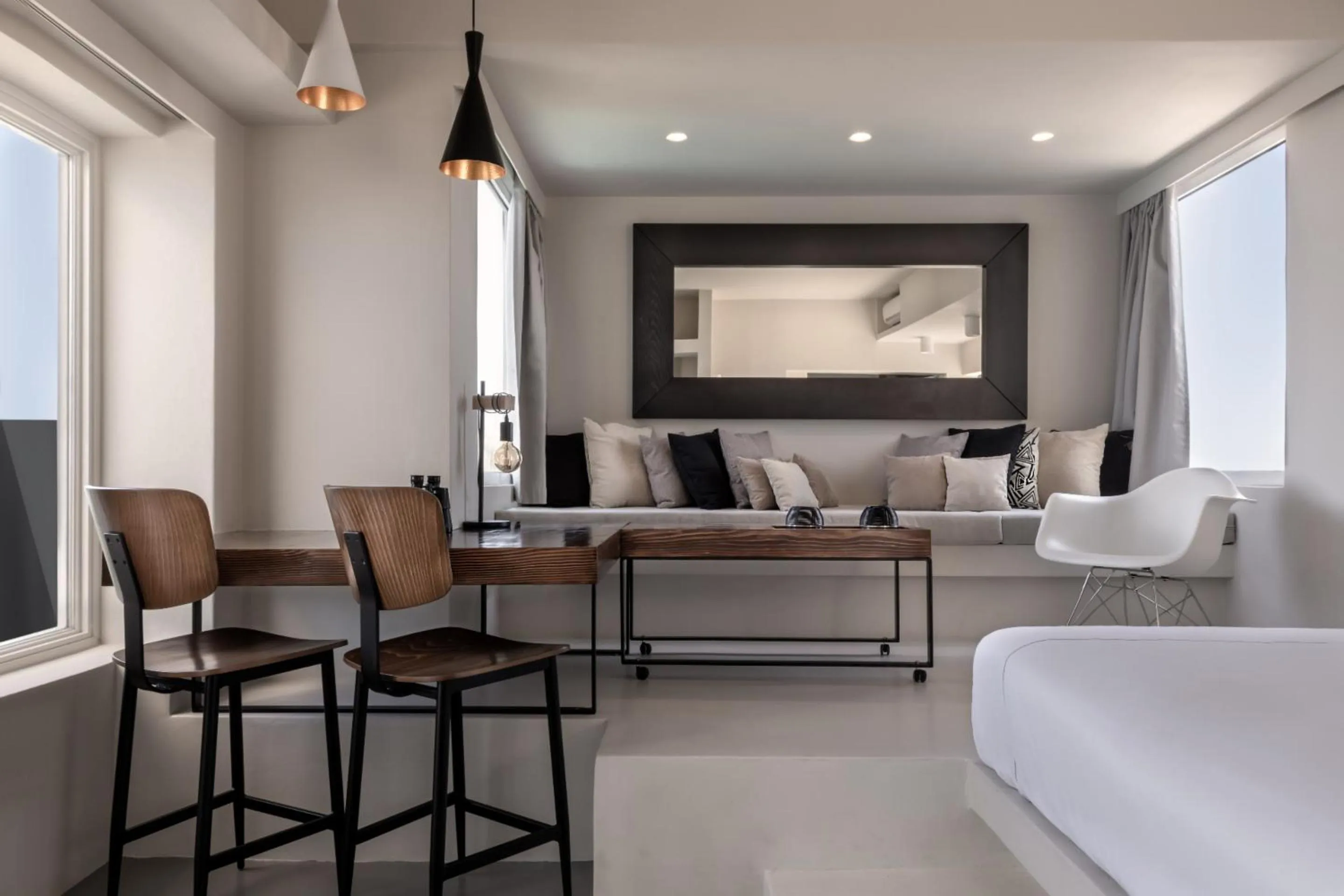 Seating area, Bed in West East Suites