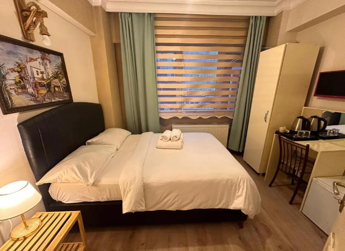 Bed in Rustic Pansiyon