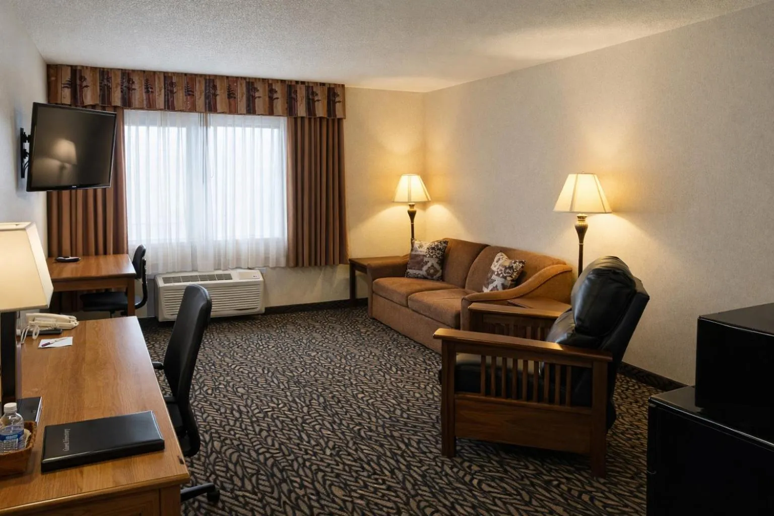 Bedroom, Bed in Fireside Inn and Suites