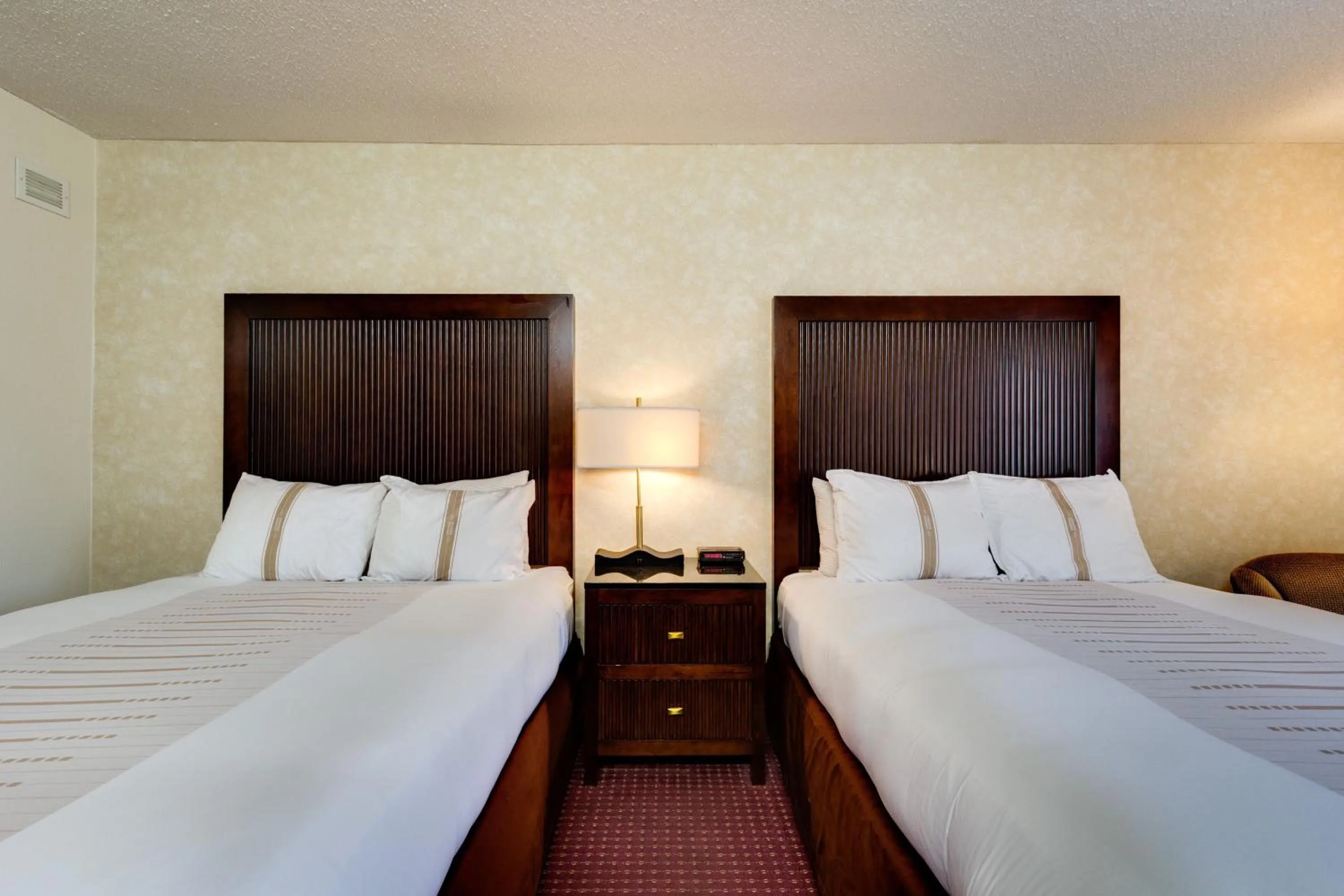 Bed in Fireside Inn and Suites