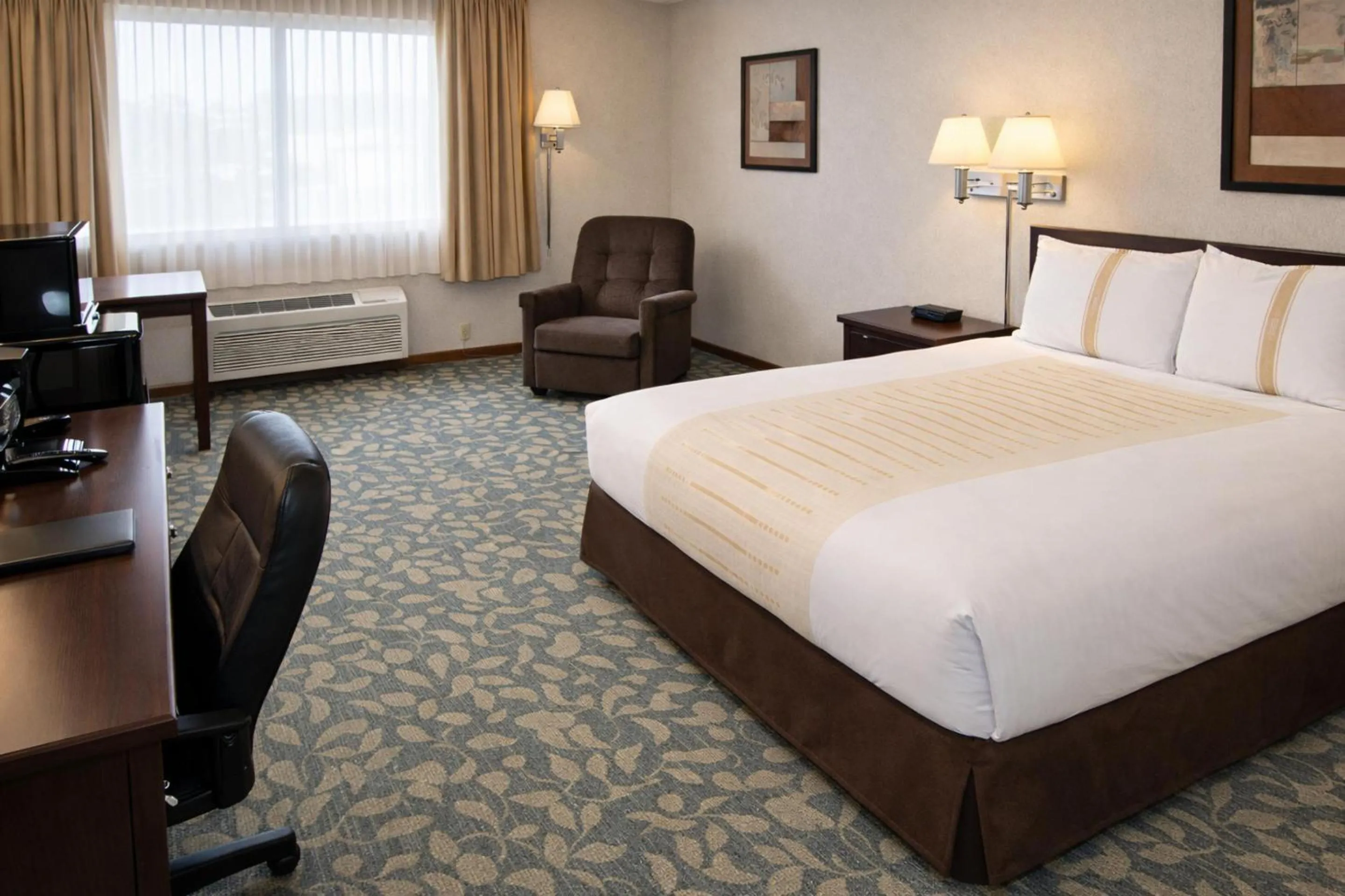 Bedroom, Bed in Fireside Inn and Suites