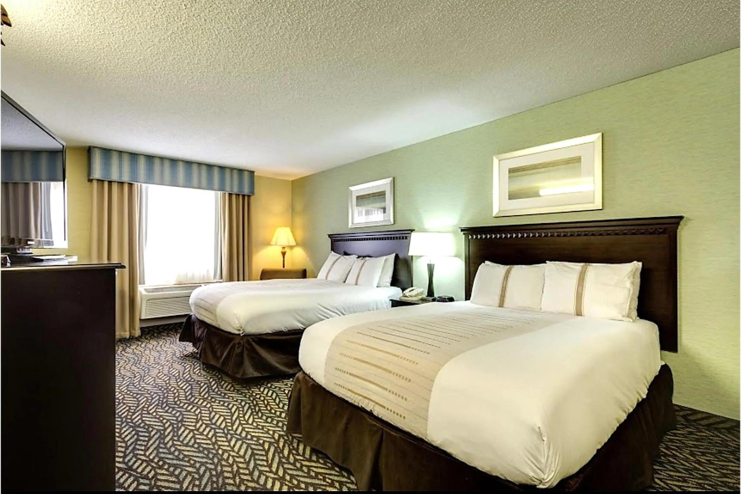 Bedroom, Bed in Fireside Inn and Suites