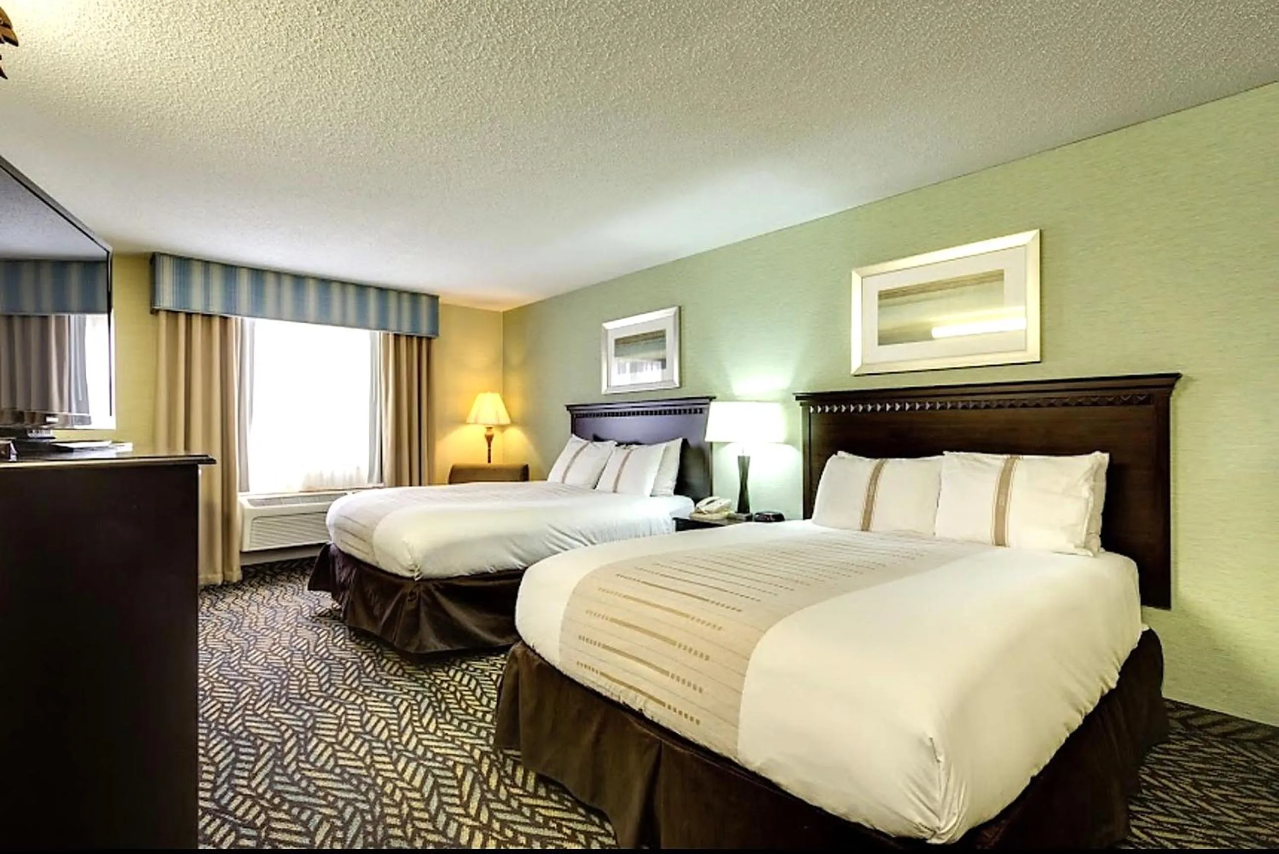 Bedroom, Bed in Fireside Inn and Suites