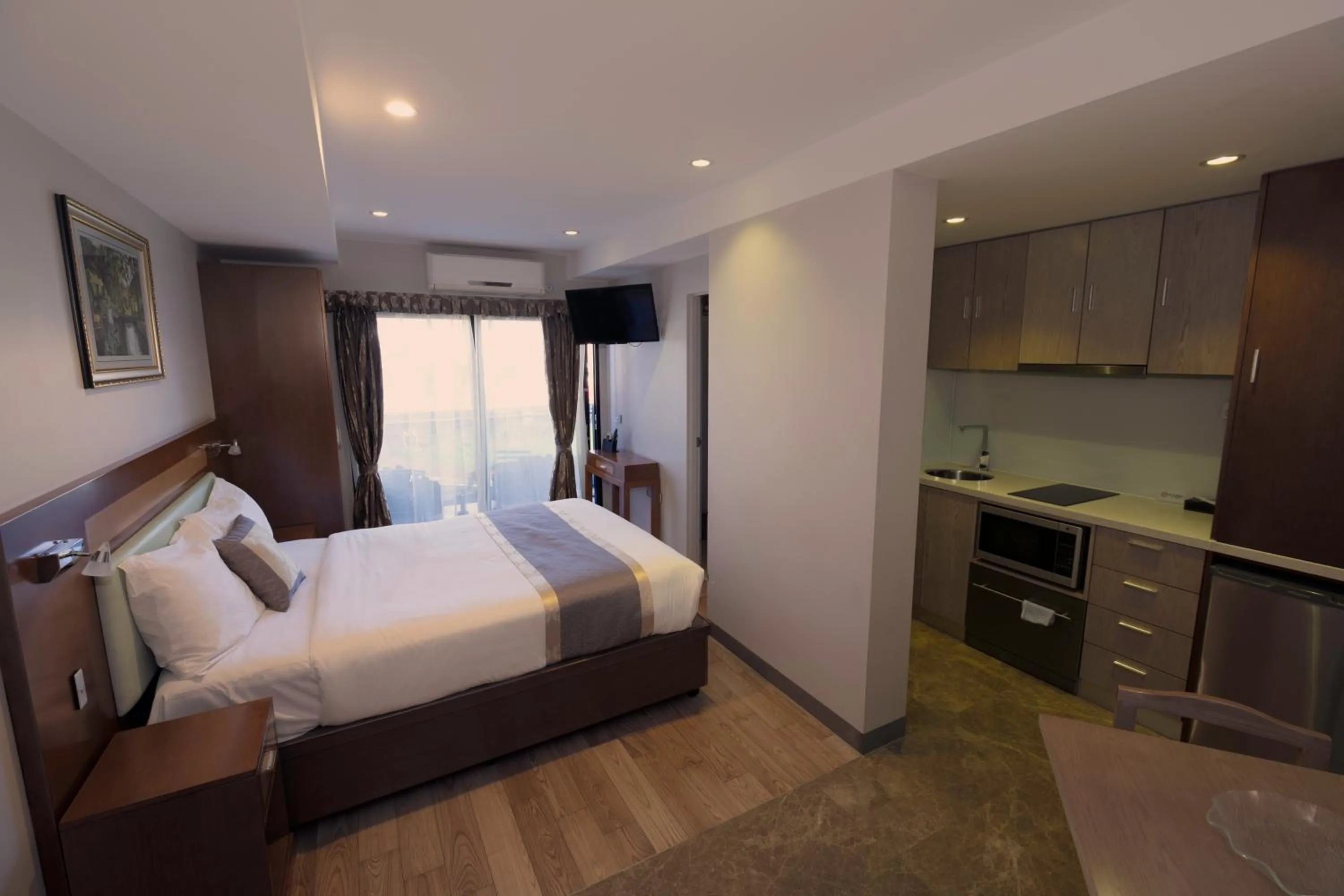 Kitchen or kitchenette, Bed in Melrose Apartments