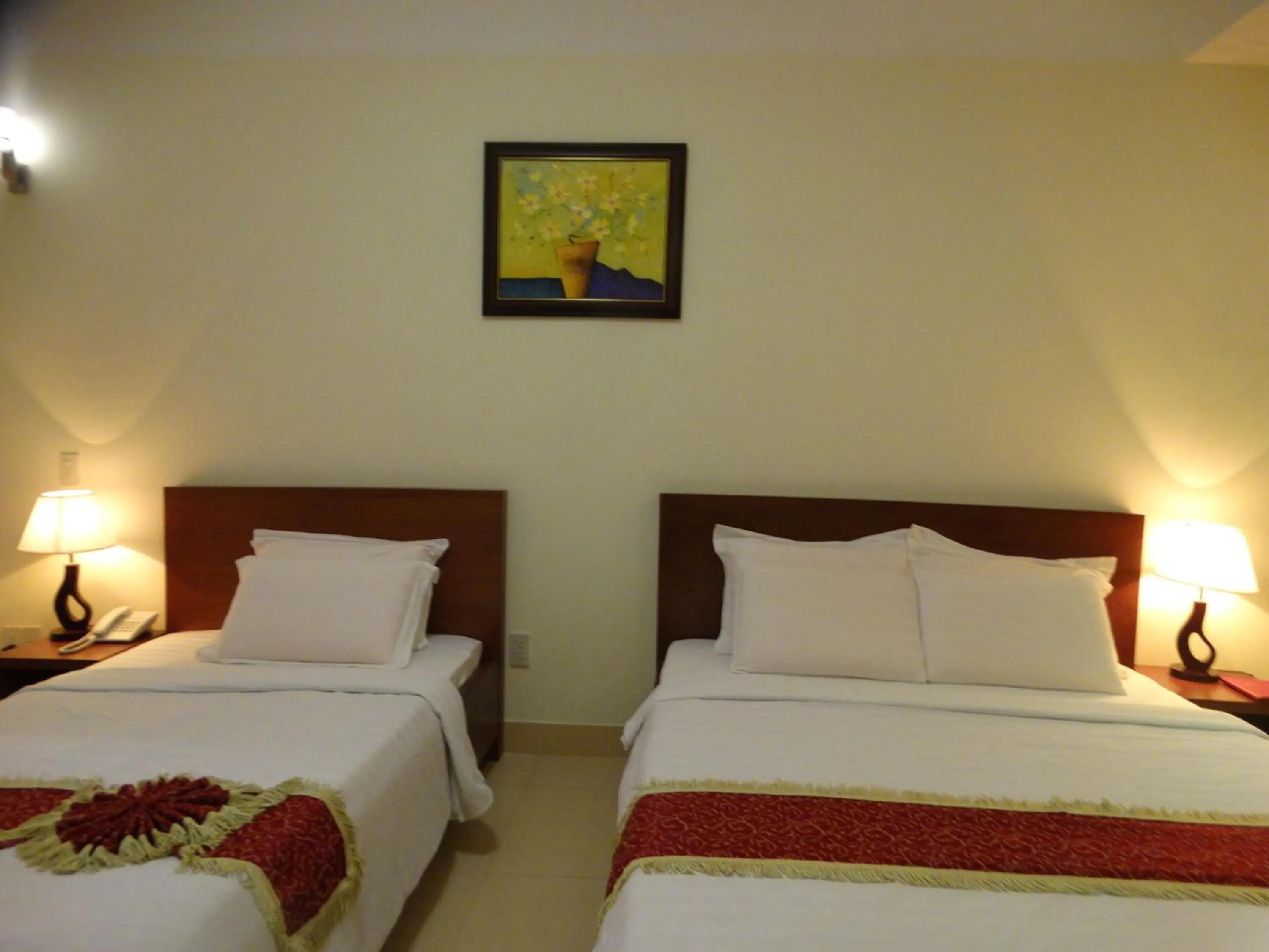 Bed in Hoa Vinh Hotel