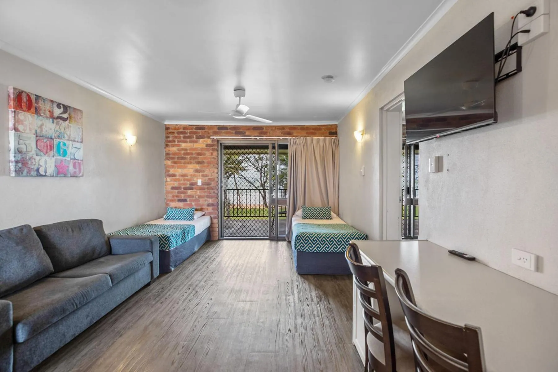 Bed in Sarina Beach Motel