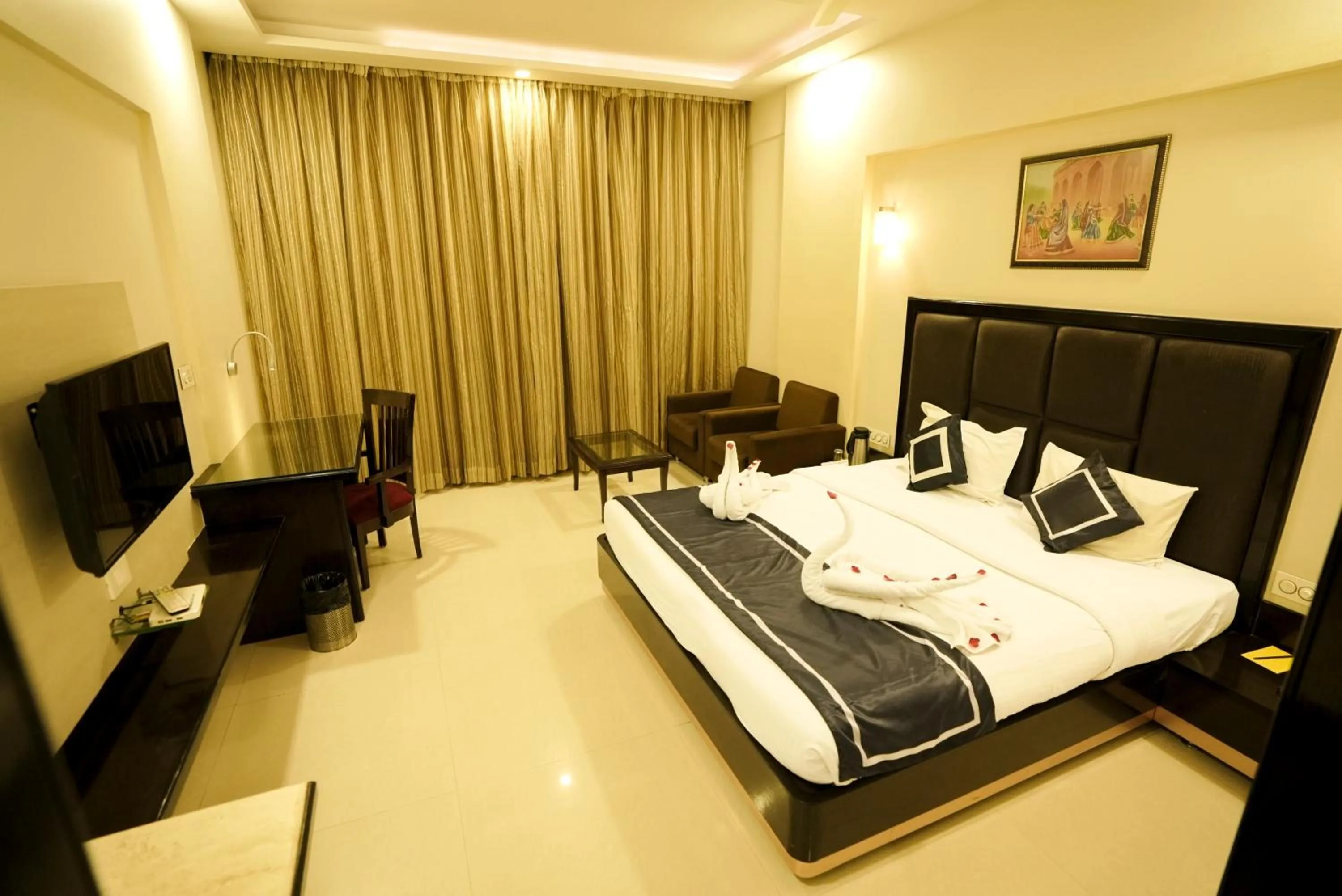 Photo of the whole room, Bed in Chandra Imperial