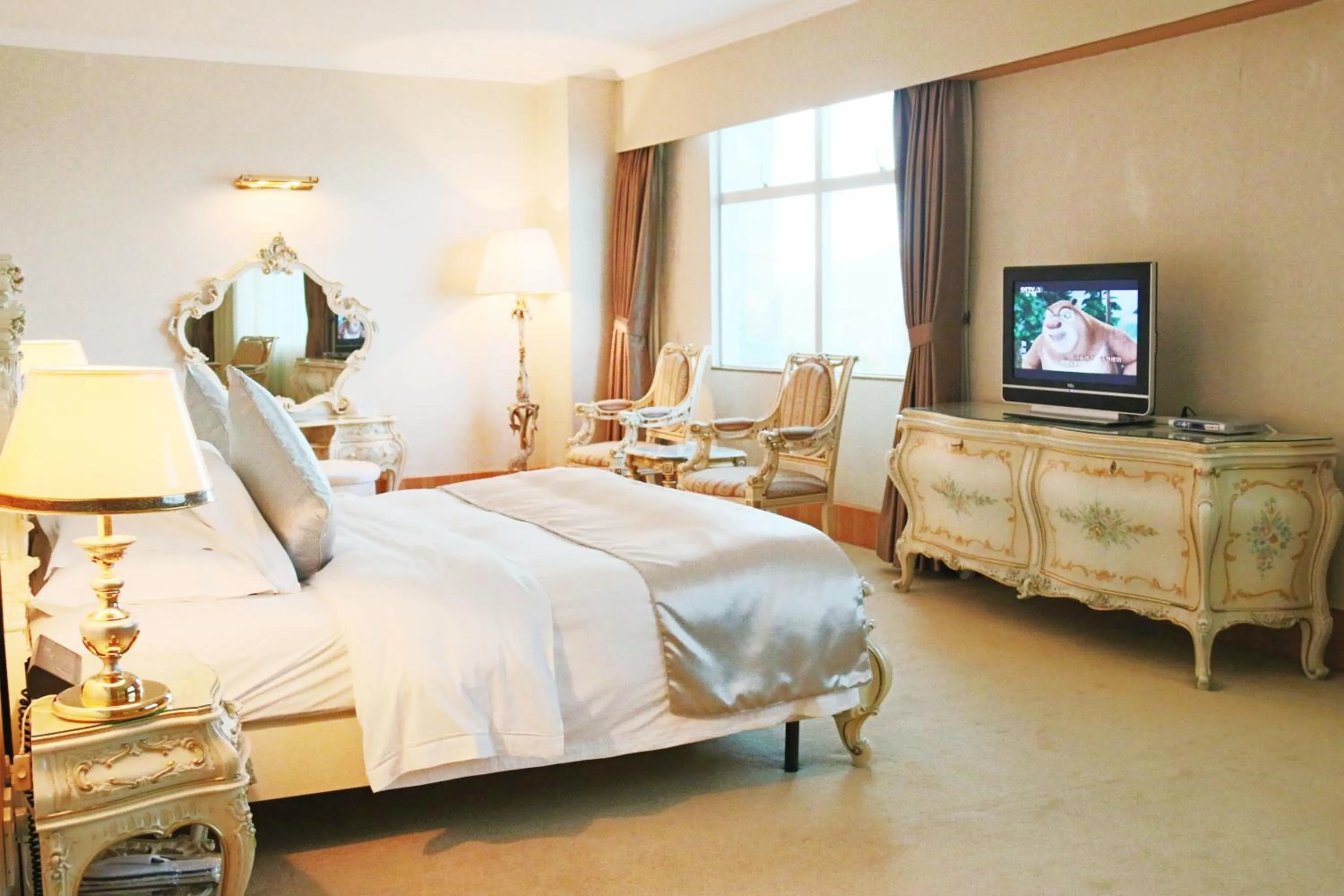Photo of the whole room, TV/Entertainment Center in Zhuhai Dehan Hotel