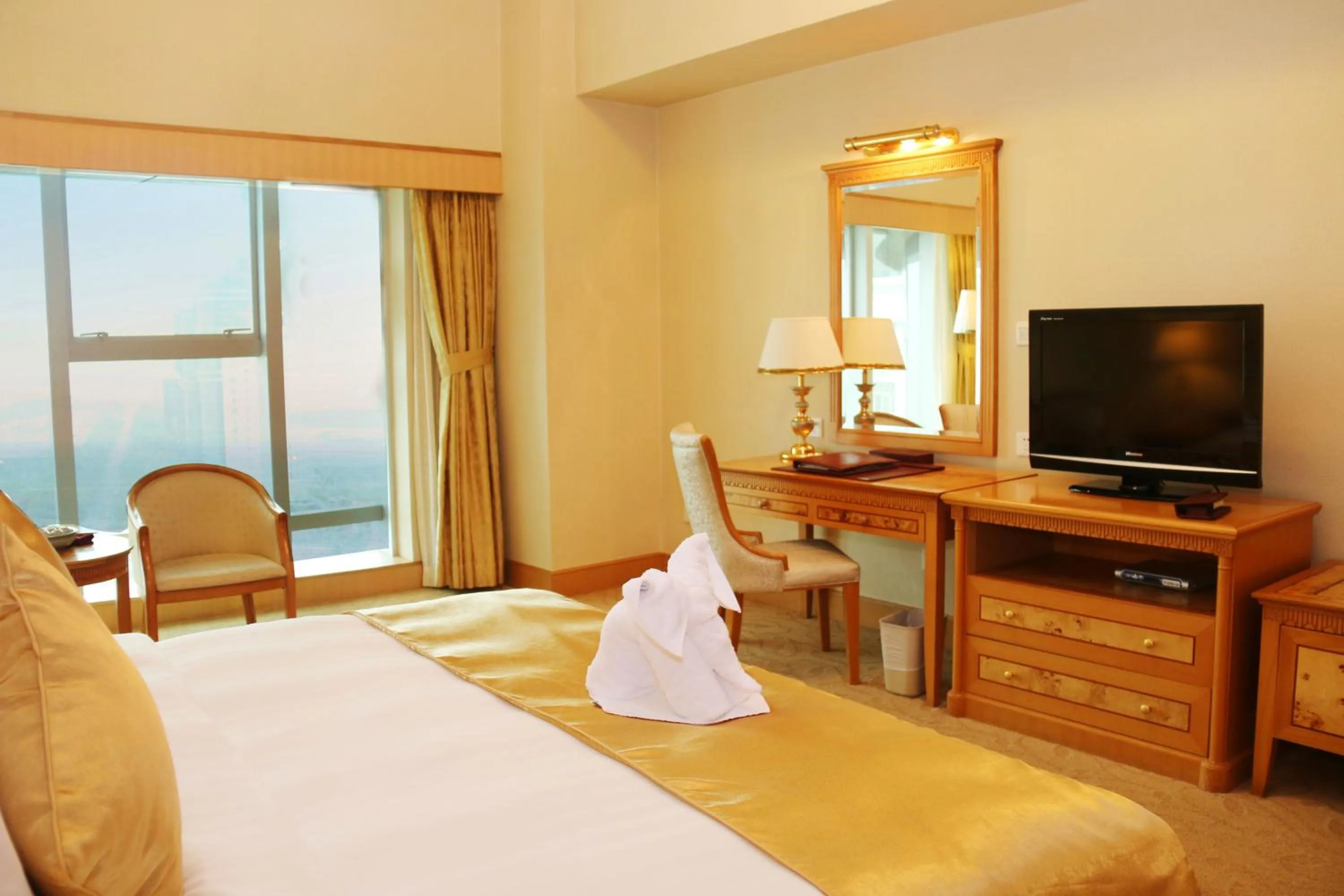 Photo of the whole room, TV/Entertainment Center in Zhuhai Dehan Hotel