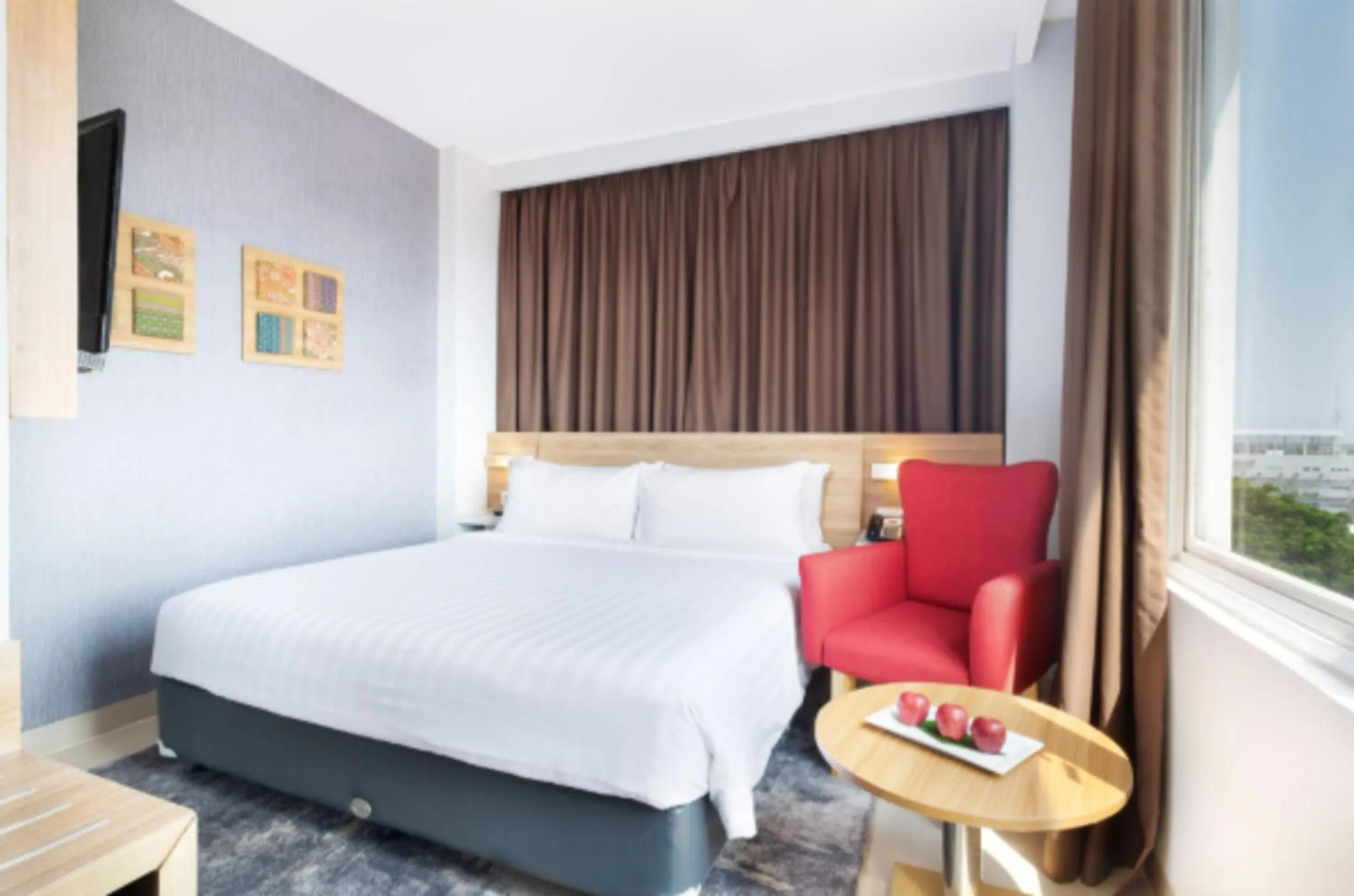 Bedroom, Bed in Hotel NEO Cirebon by ASTON