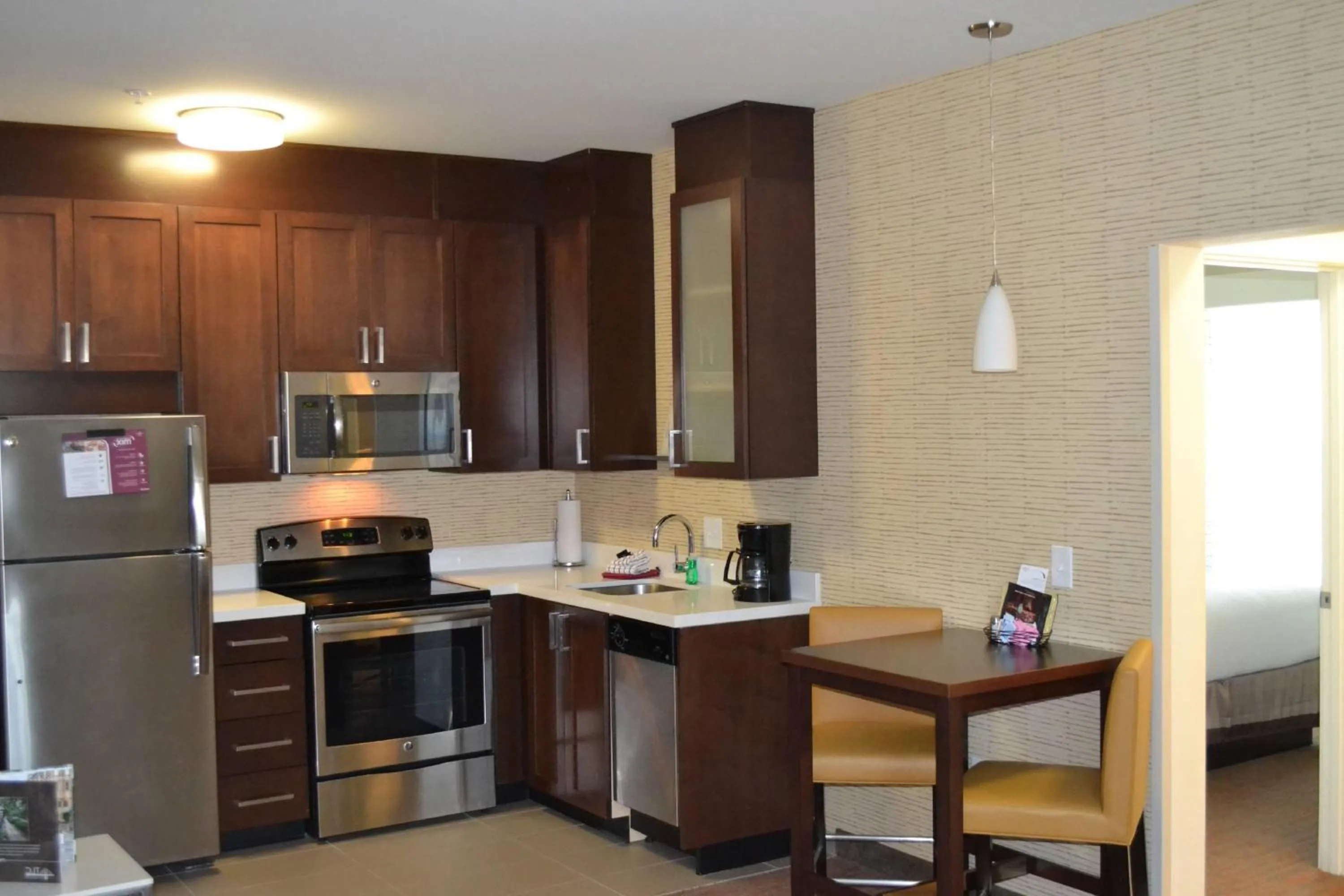 kitchen in Residence Inn by Marriott Savannah Airport